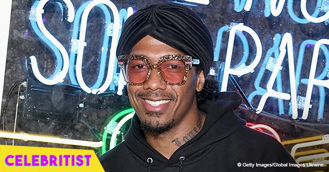 Nick Cannon's 3 children rock long curly locks while 'working out' with their dad