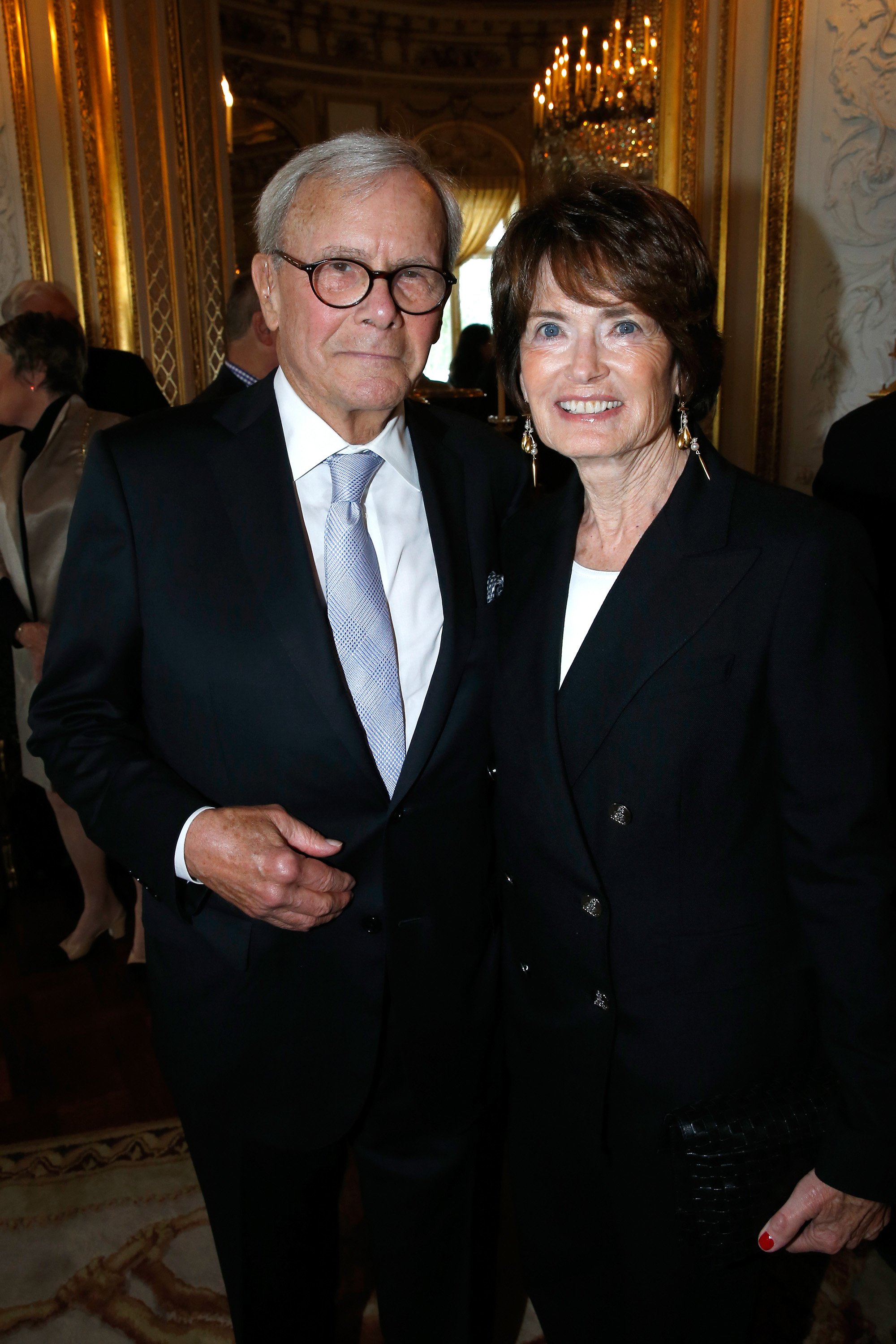     Tom Brokaw and wife Meredith Lynn Auld attend Tom Hanks, Tom Brokaw & Gordon "pseudo" Mueller receives the Legion of Honor medal at the Palace of the Legion of Honor in Paris on May 19, 2016 |  Source: Getty Images