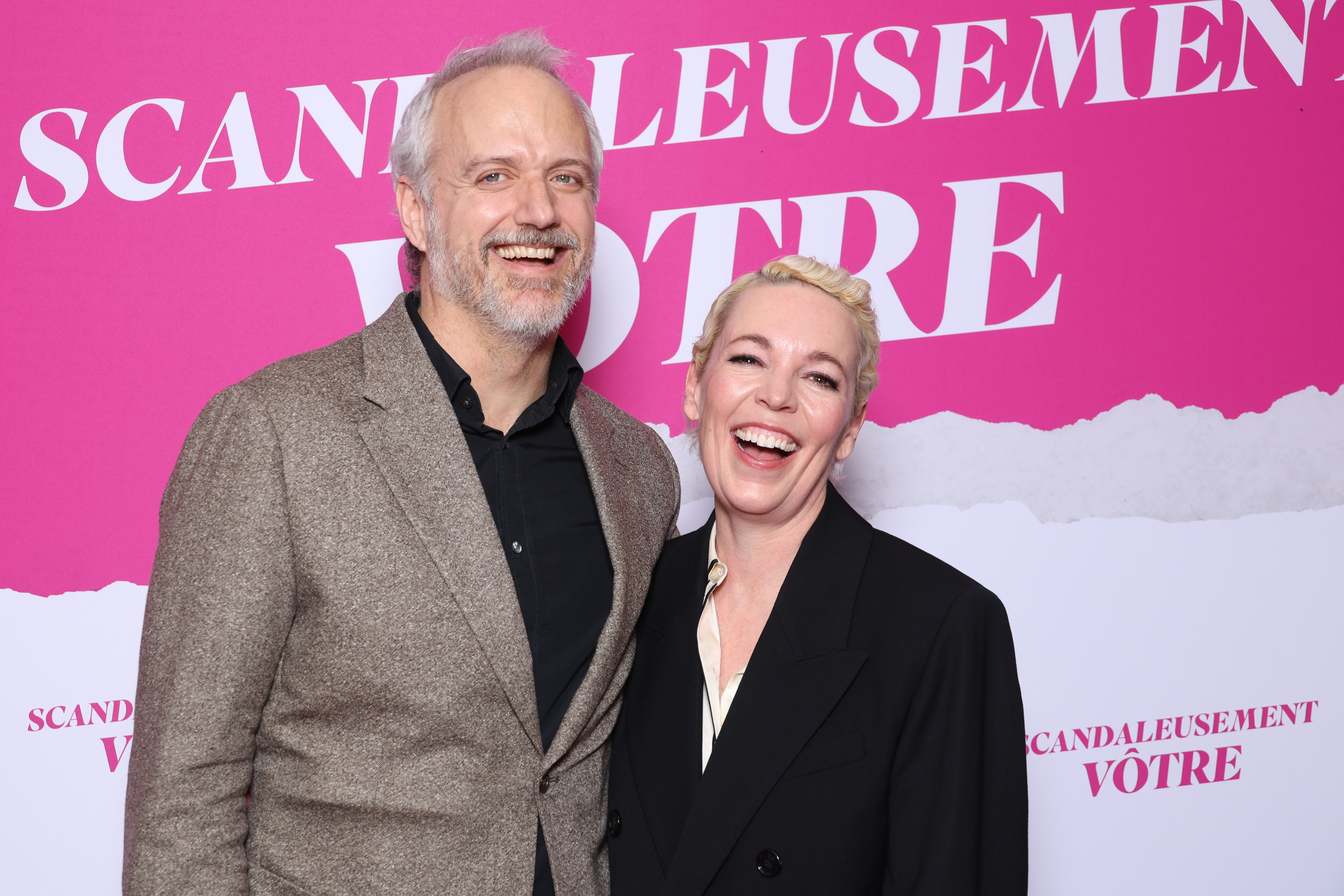 Ed Sinclair and Olivia Colman attend the "Wicked Little Letters - Scandaleusement Votre" Paris Premiere At Drugstore Publicis Cinema on 14 February 2024 in Paris, France. | Source: Getty Images