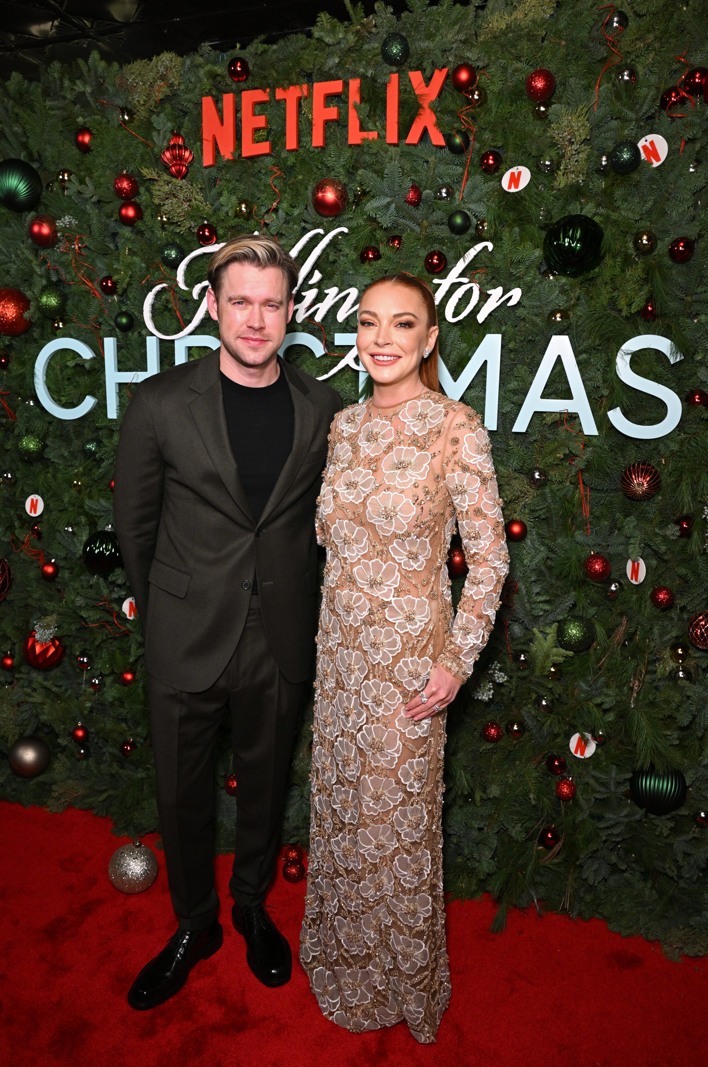 Chord Overstreet and Lindsay Lohan attend Netflix’s "Falling For Christmas" celebratory Holiday fan screening with cast & crew on November 9, 2022, in New York City. | Source: Getty Images