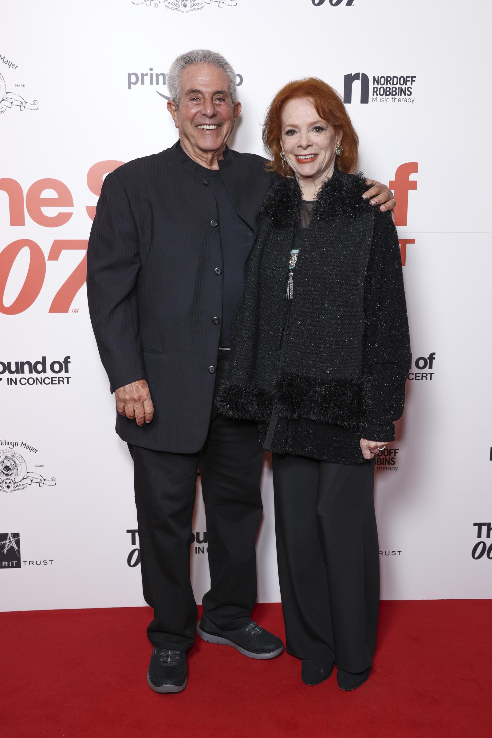 Michael Jay Solomon and Luciana Paluzzi attend The Sound of 007 in concert in London, England, on October 4, 2022. | Source: Getty Images