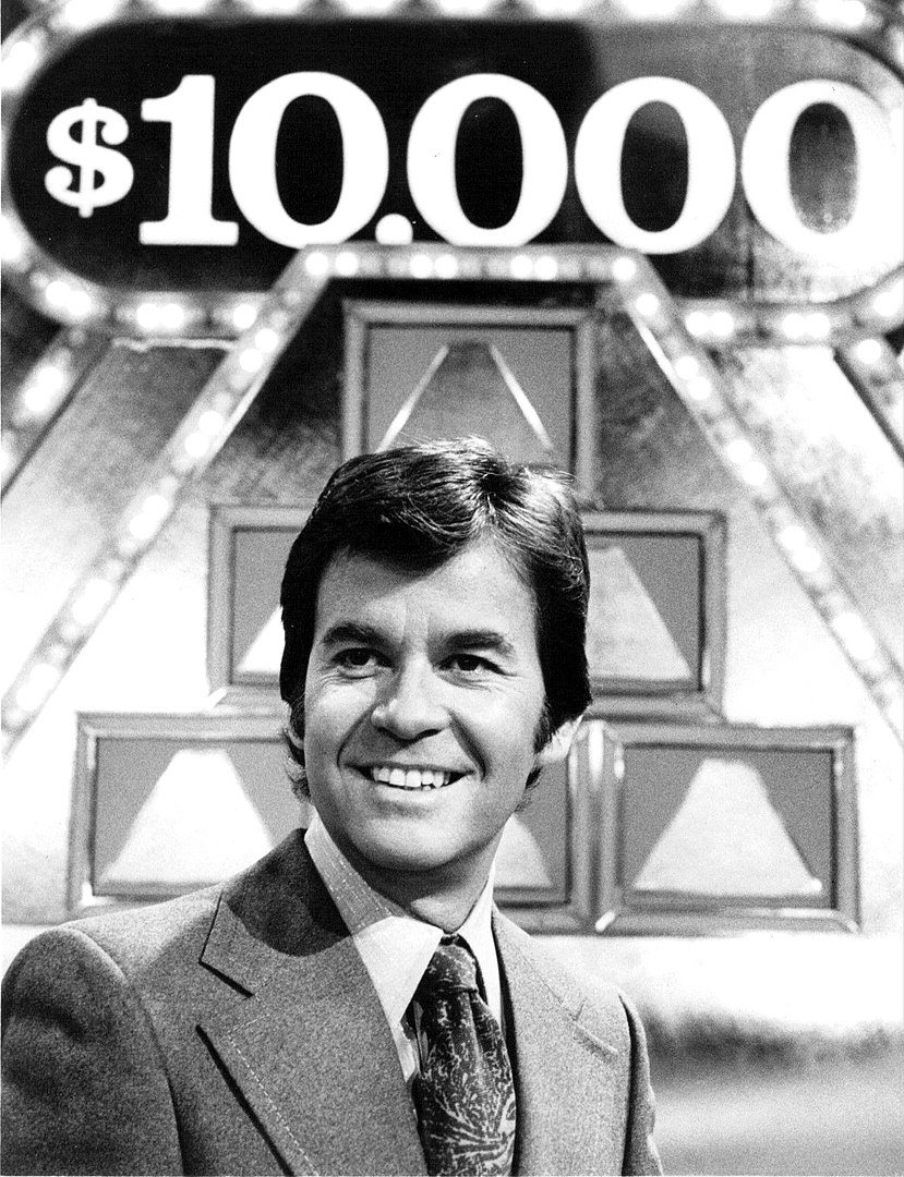 Publicity photo of Dick Clark as host of the television game show The $10,000 Pyramid | Photo: Wikimedia Commons Images