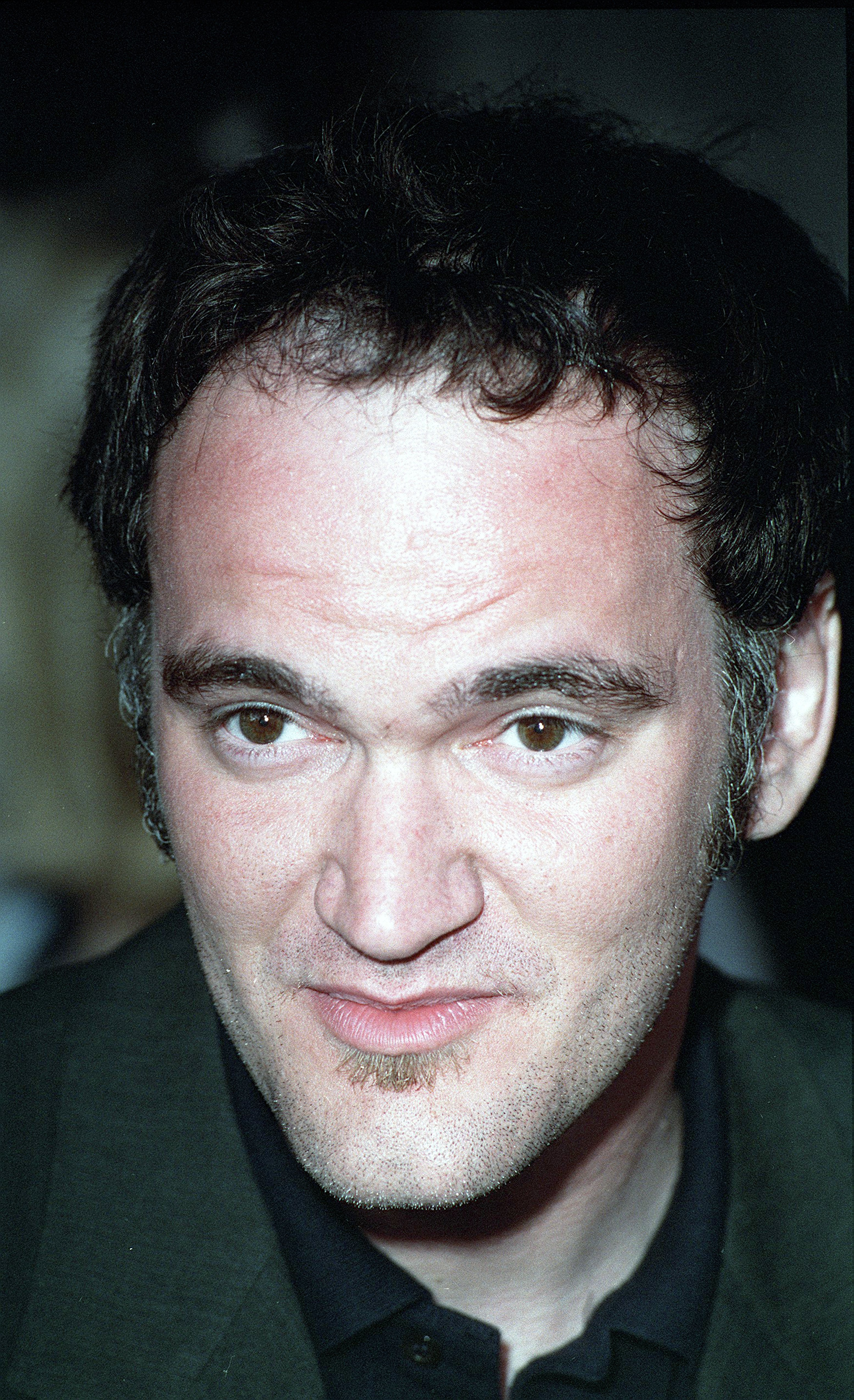 A headshot image of film director and actor Quentin Tarantino in 1992.┃Source: Getty Images
