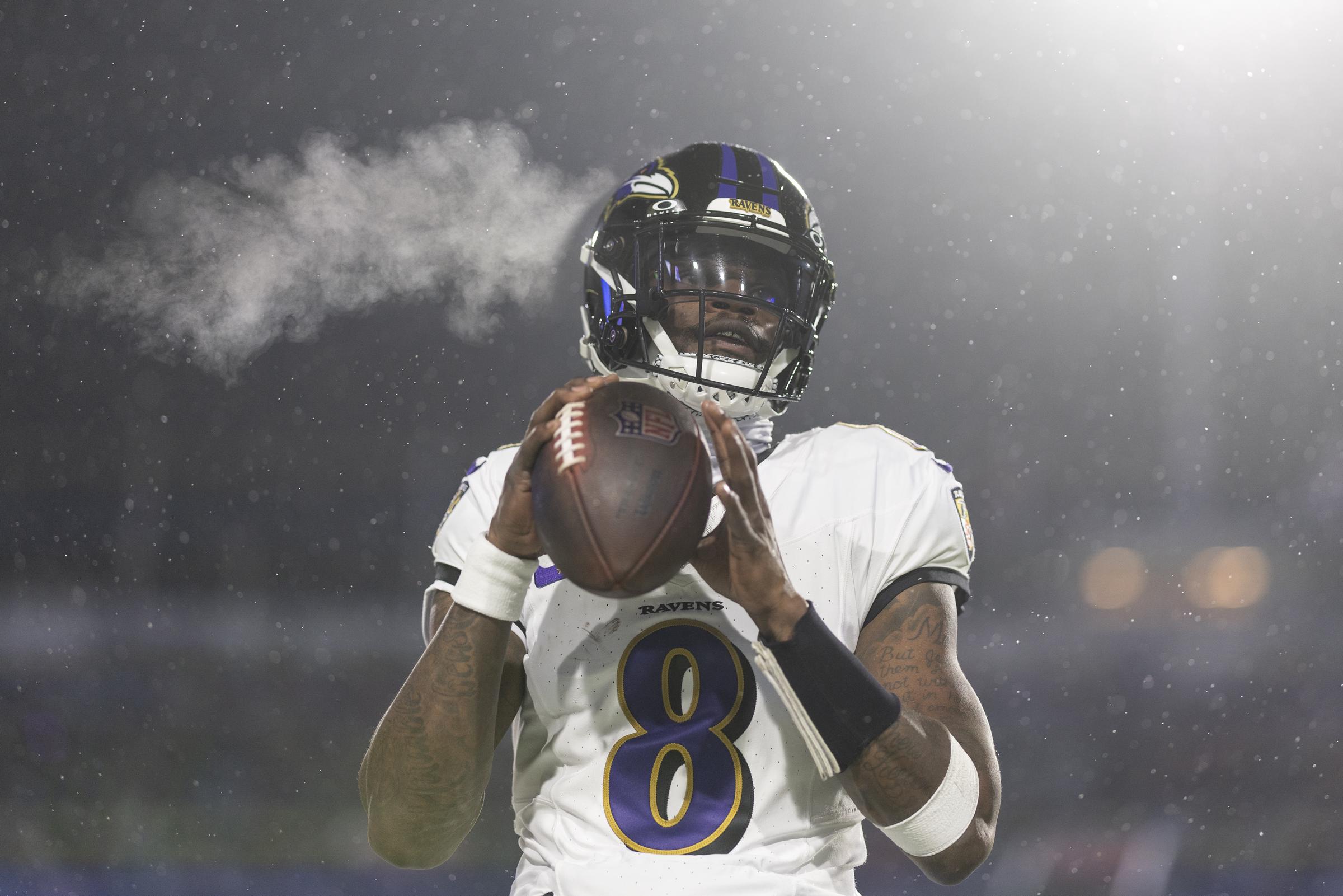 Lamar Jackson #8 of the Baltimore Ravens looks to pass prior to an NFL Football game against the Buffalo Bills at Highmark Stadium on January 19, 2025, in Orchard Park, New York | Source: Getty Images