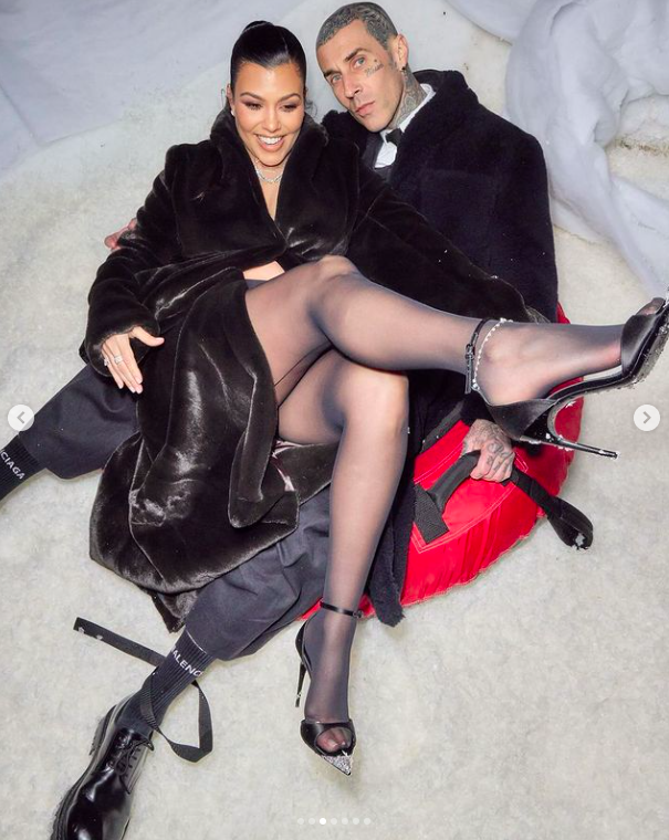 Kourtney Kardashian and Travis Barker at an event, posted on December 29, 2023 | Source: Instagram/kourtneykardash