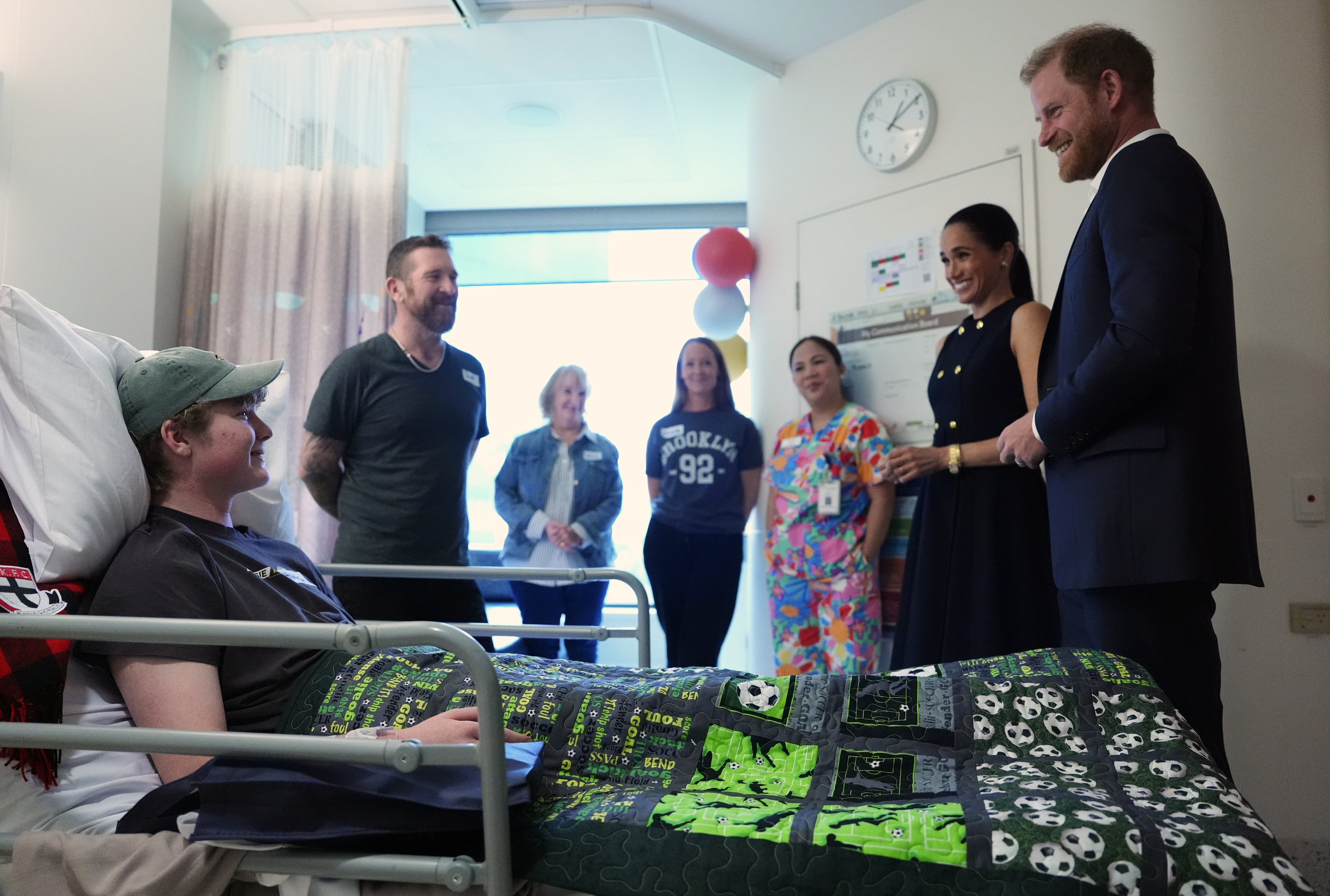 Meghan, Duchess of Sussex, and Prince Harry, Duke of Sussex, visit patient Hamish and family members at the Royal Children's Hospital on April 14, 2026, in Melbourne, Australia. | Source: Getty Images