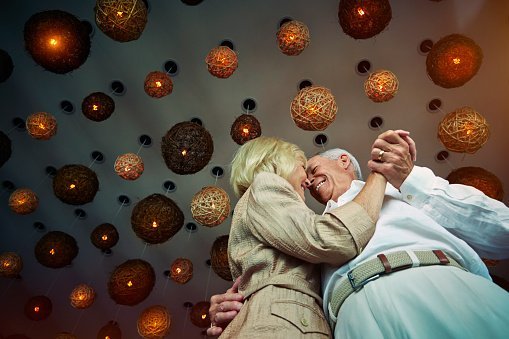 Two elderly people pictured having a dance | Photo: Getty Images