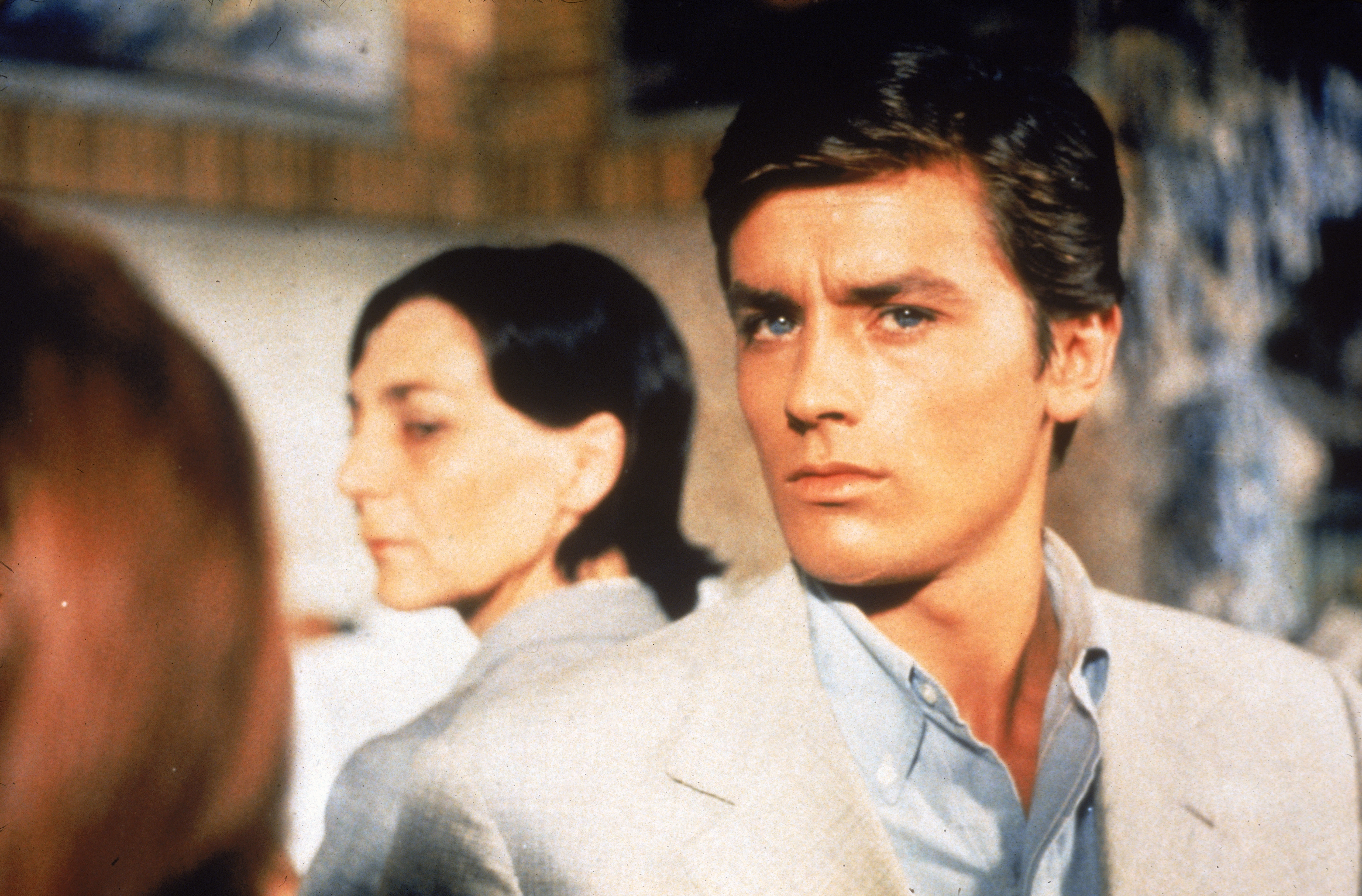 Alain Delon posing as his character in 