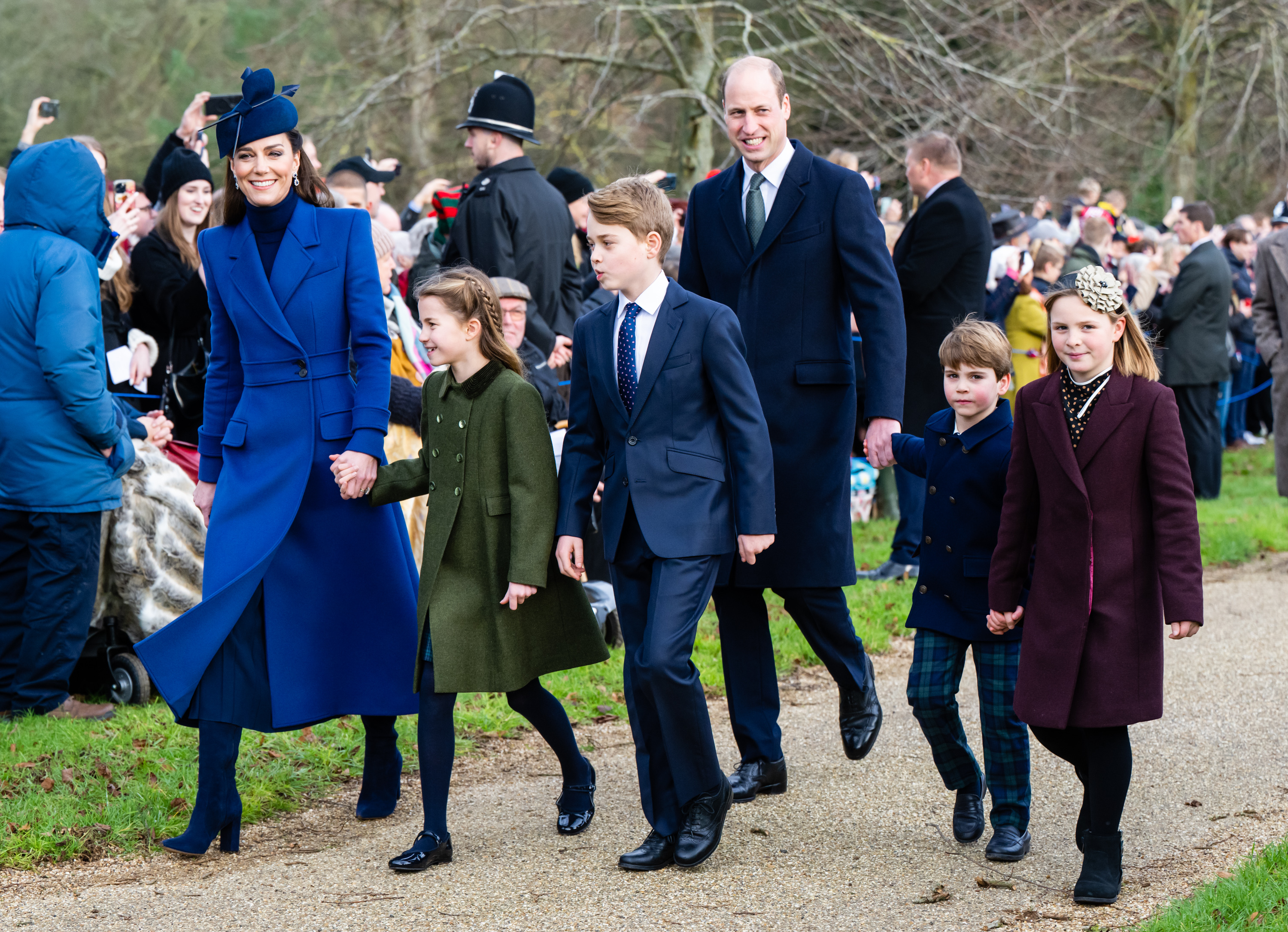 Catherine, Princess of Wales walking hand-in-hand with Princess Charlotte, Prince George, Prince William, Prince Louis and Mia Tindall at the Christmas morning service at Sandringham Church on December 25, 2023 in Sandringham, Norfolk | Source: Getty Images