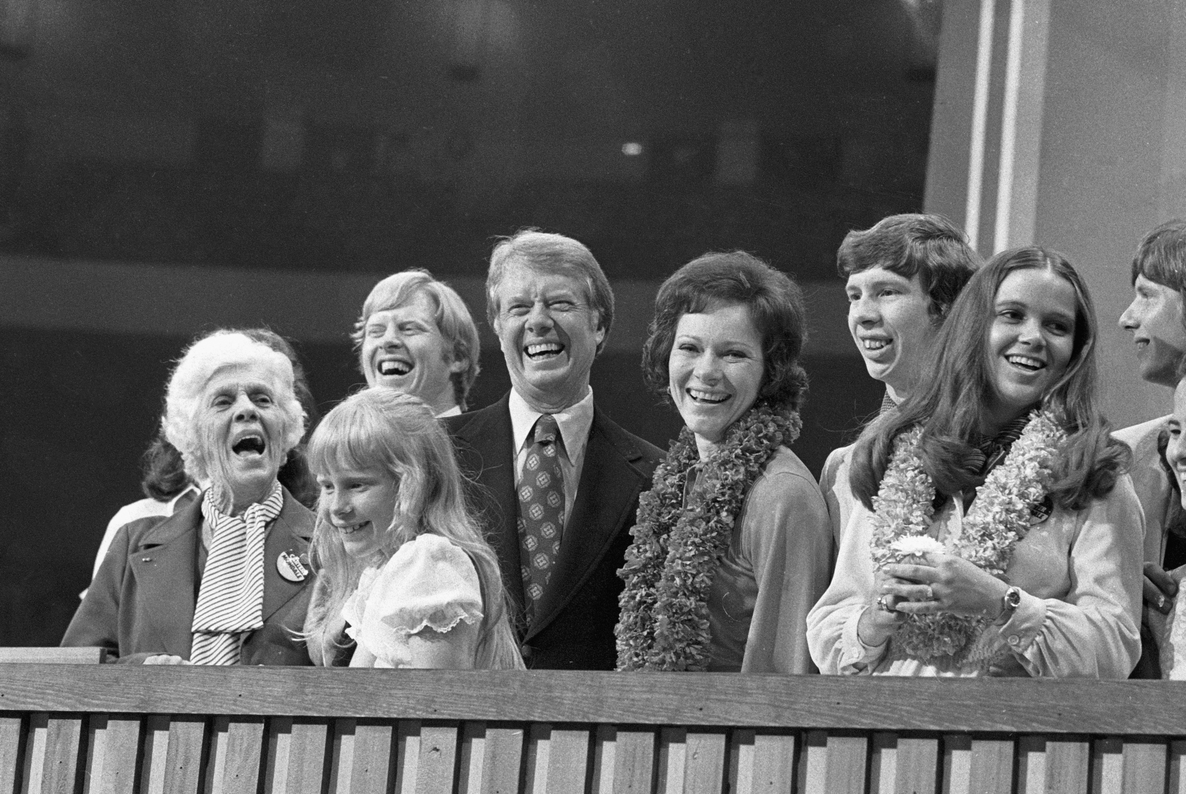 Lillian, Amy, Jack, Jimmy, Rosalynn, Jeff, Annette, Chip, and Caron Carter on the podium after Jimmy gave his acceptance speech on July 15, 1976 | Source: Getty Images
