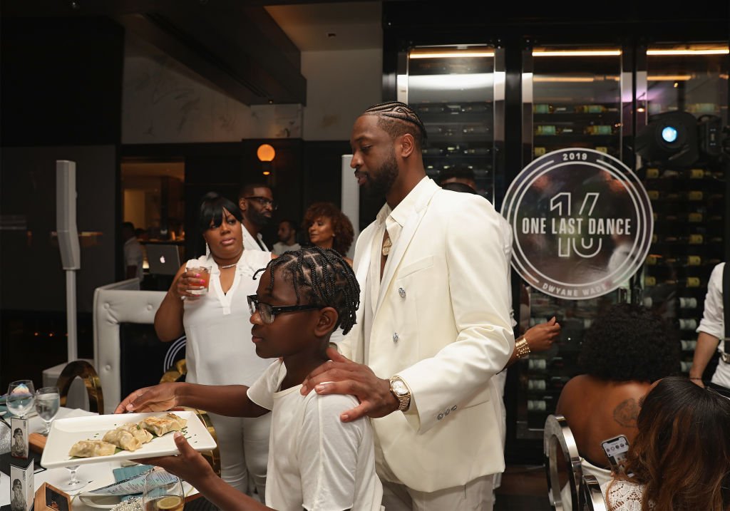 Zion Wade and Dwyane Wade attend Dwyane Wade's 16 Year NBA Career Celebration Dinner | Photo: Getty Images