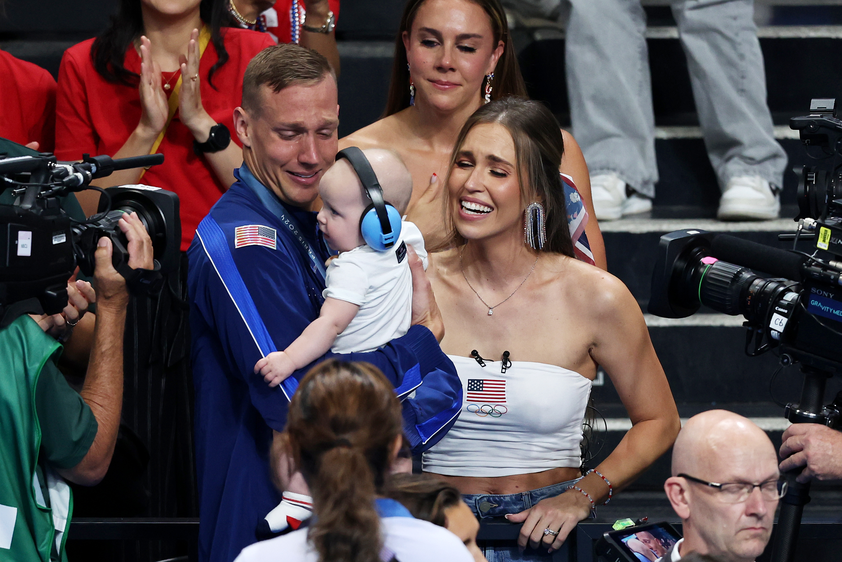 Caeleb Dressel with his wife and child on July 27, 2024 | Source: Getty Images