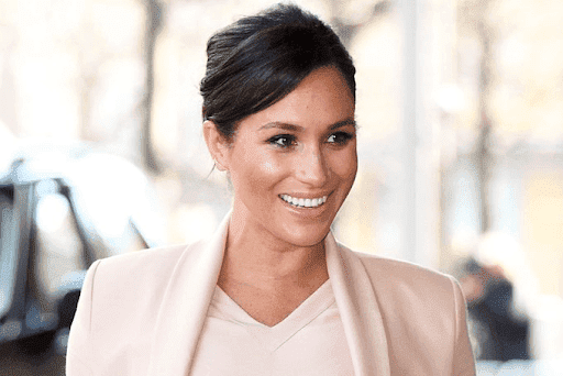 A smiling Meghan Markle. l Image: Twitter/ Marie Claire. 