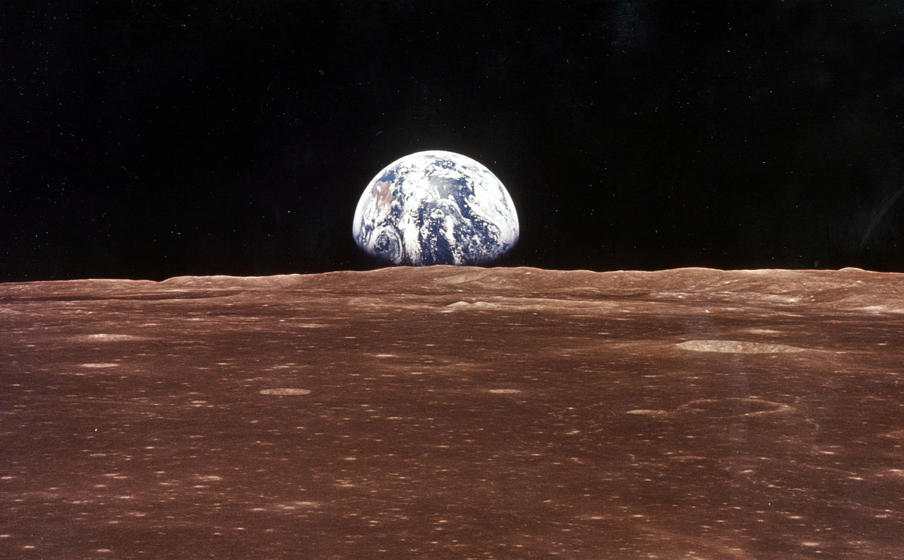 Earth as seen over the lunar horizon from the Apollo 11 in 1999. | Source: Getty Images