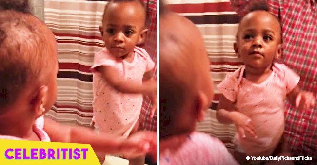 Baby girl melts hearts dancing along to dad's rapping in adorable video