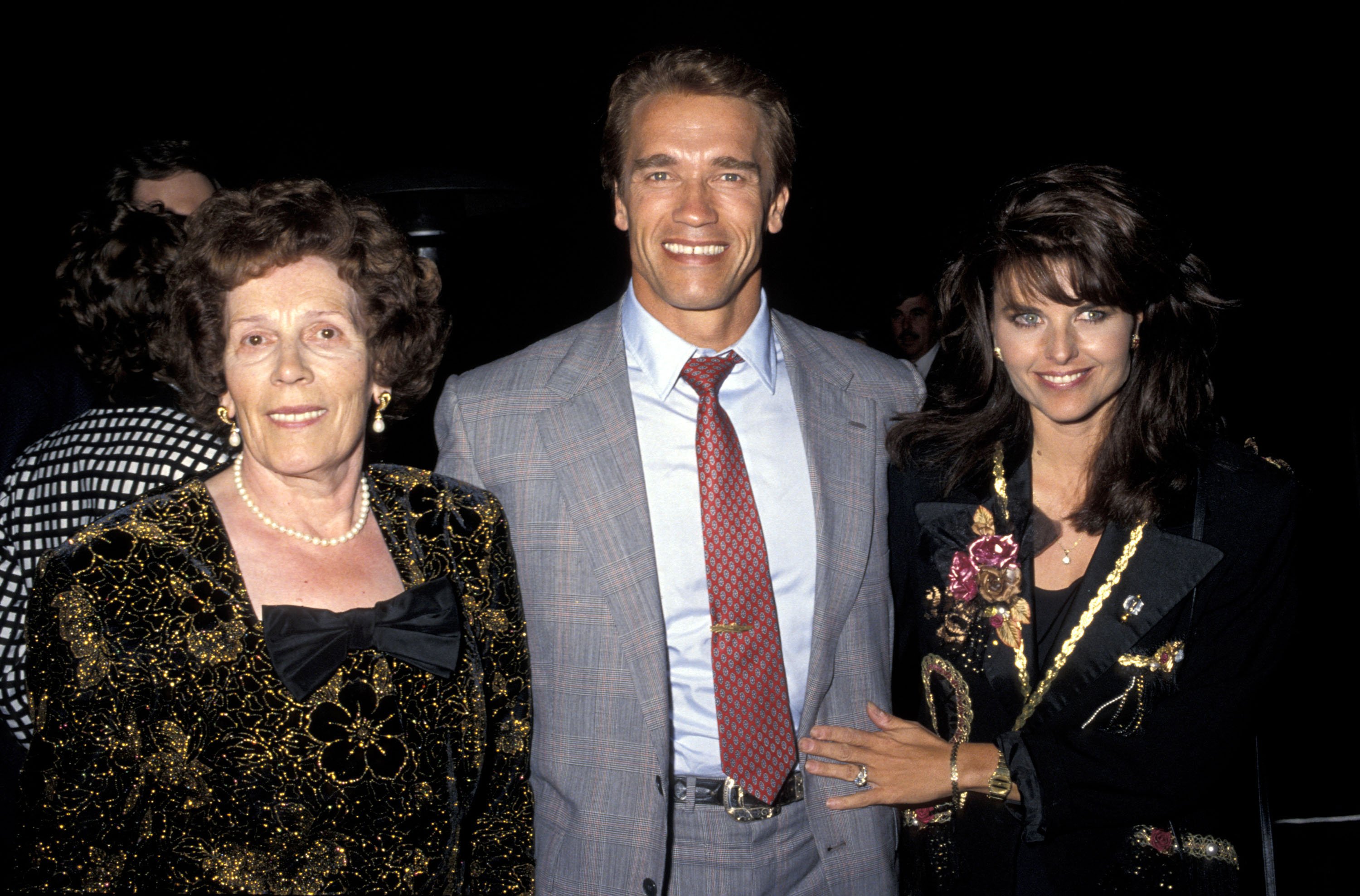 Arnold Schwarzenegger, Maria Shriver, and Aurelia Schwarzenegger at the world premiere of "Total Recall," in Hollywood, California on May 31, 1990 | Source: Getty Images