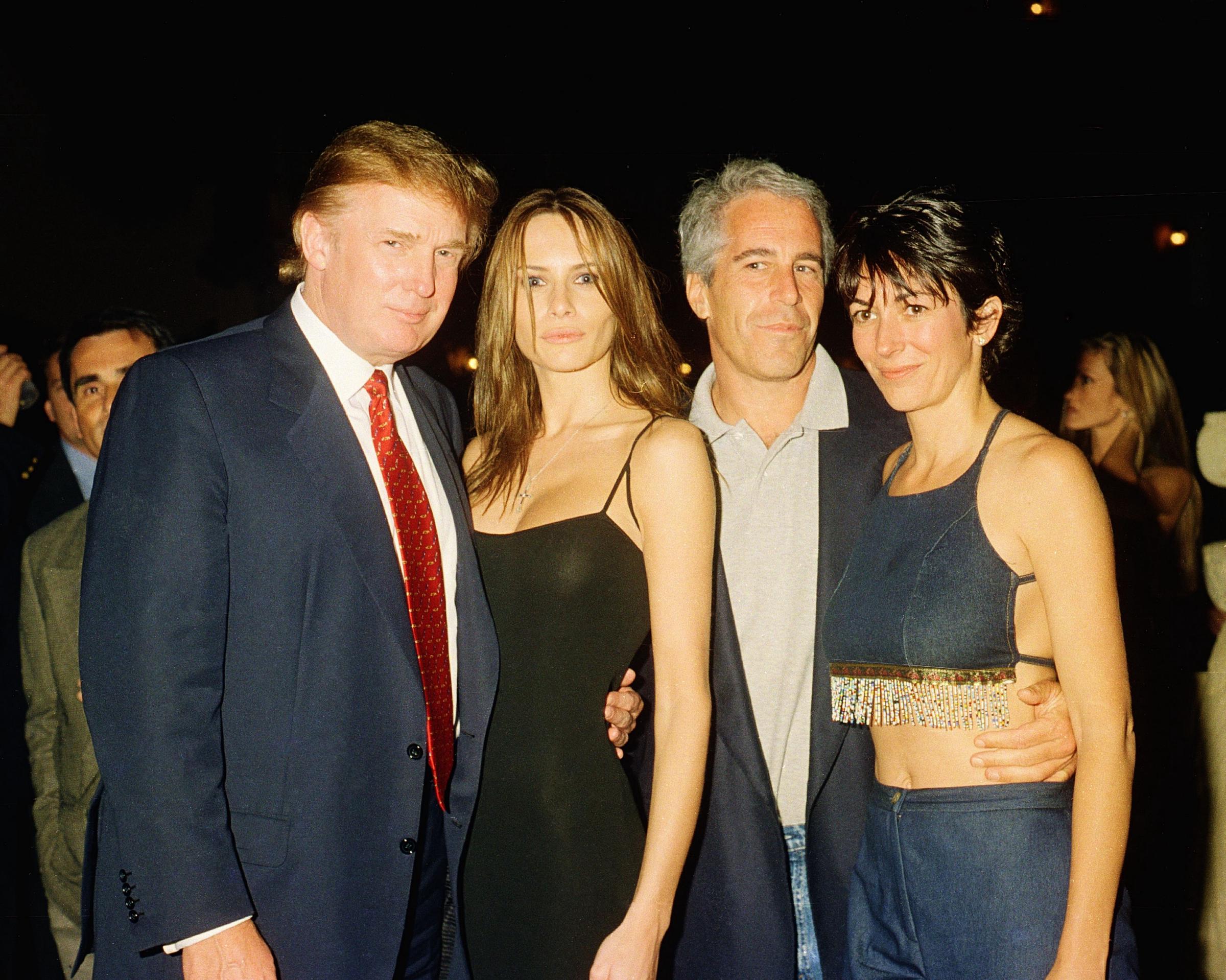 Donald Trump and his then-girlfriend (and future wife) Melania Knauss pose with financier Jeffrey Epstein and British socialite Ghislaine Maxwell at the Mar-a-Lago Club in Palm Beach, Florida, on February 12, 2000. | Source: Getty Images