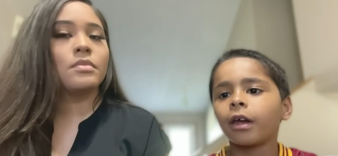 Picture of Quinci and his mom speaking about the incident. | Source: Youtube/Inside Edition