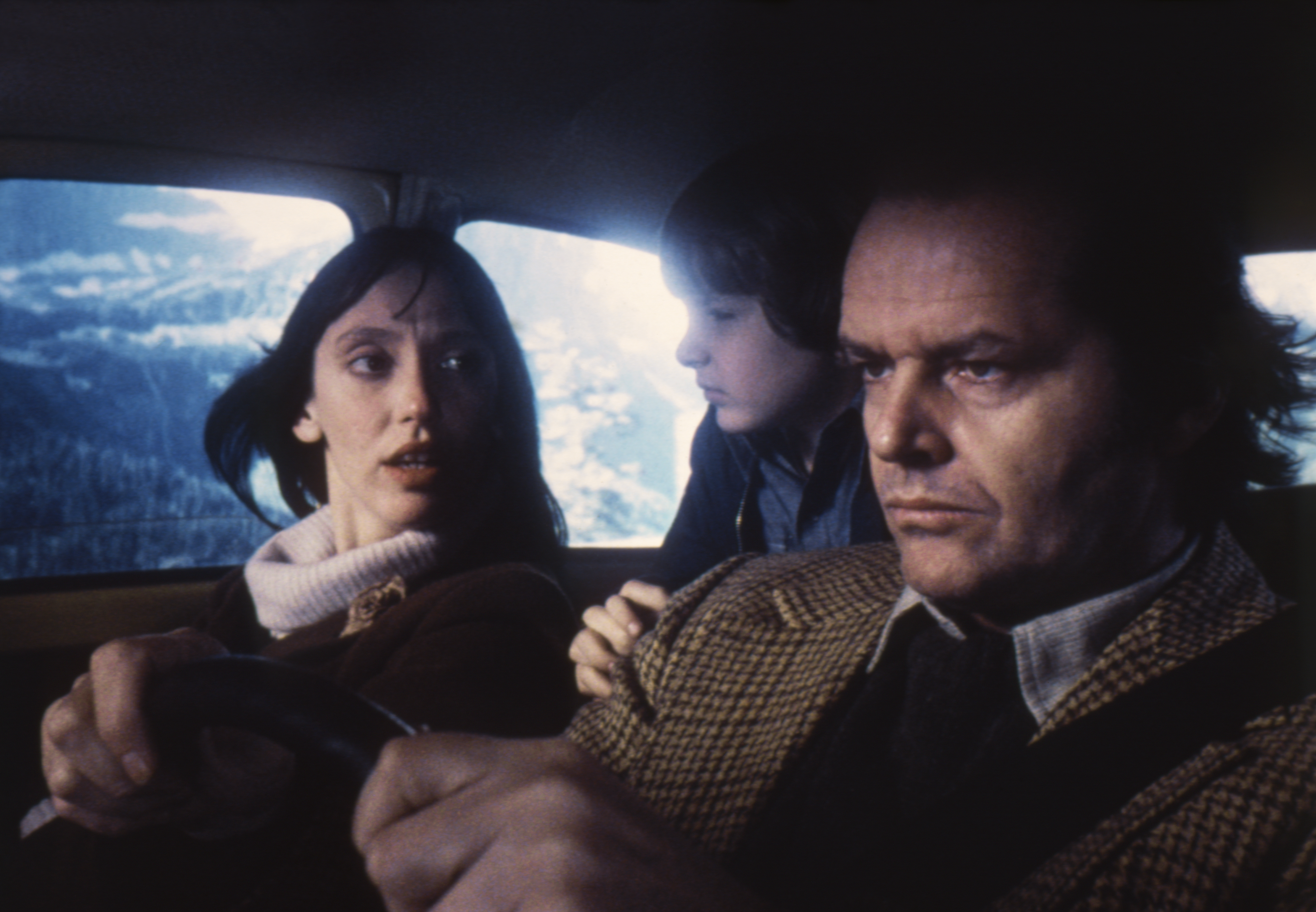 American actors Jack Nicholson, Danny Lloyd, and Shelley Duvall on the set of "The Shining," based on the novel by Stephen King and directed by Stanley Kubrick. | Source: Getty Images