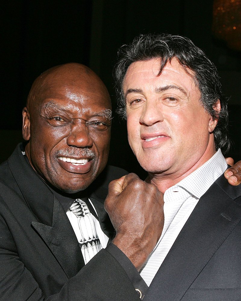 Tony Burton and Sylvester Stallone pose at the premiere of MGM's "Rocky Balboa" after party held at the Hollywood and Highland Ballroom, on December 13, 2006 in Hollywood, California. I Image: Getty Images.
