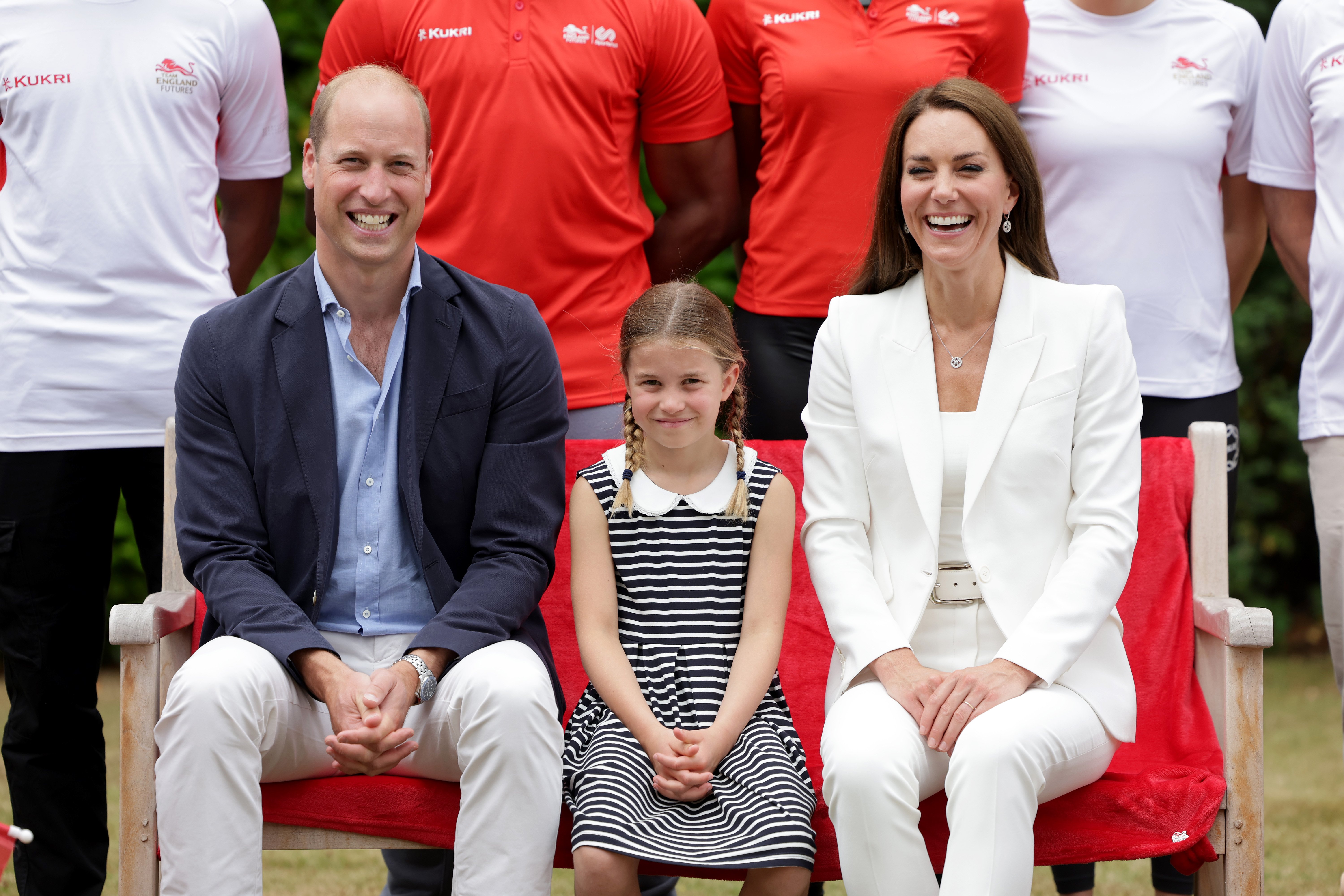 Prince William, Duke of Cambridge, Catherine, Duchess of Cambridge and Princess Charlotte of Cambridge pose for a photograph at Sportsid House at the 2022 Commonwealth Games on August 02, 2022 in Birmingham, England. | Source: Getty Images