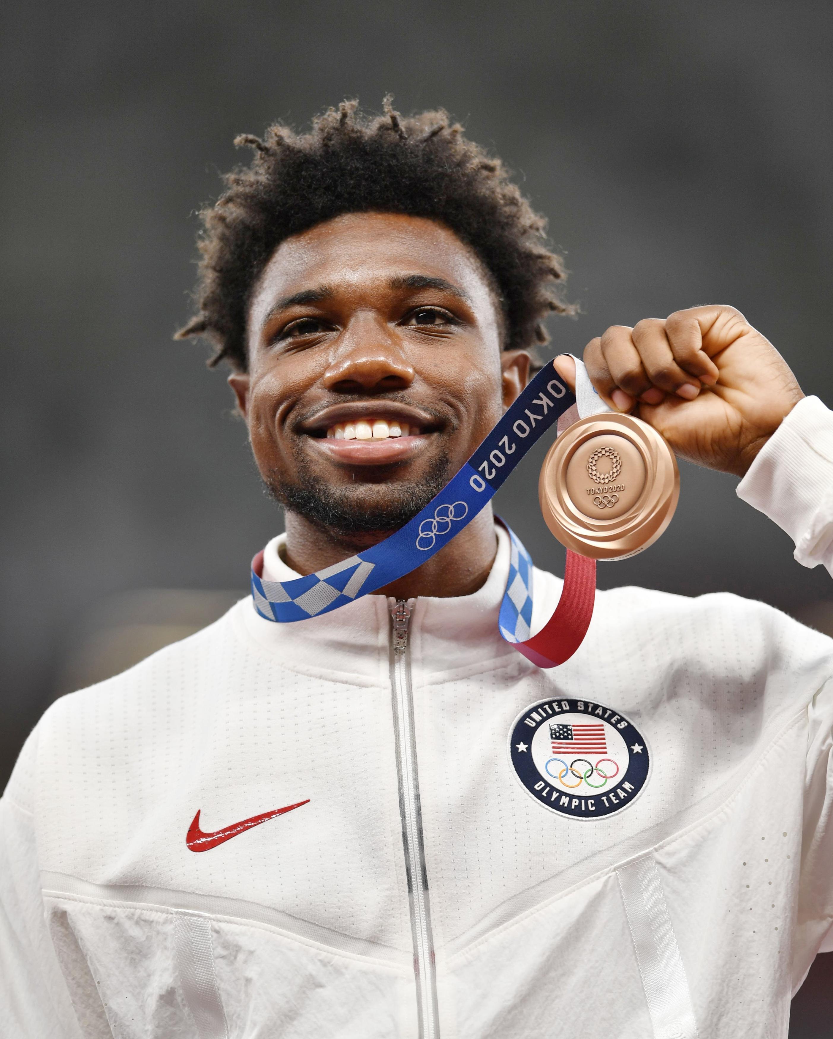 Noah Lyles of the United States poses with his bronze medal for the men's 200 meters at the Tokyo Olympics on Aug. 5, 2021, at the National Stadium in Tokyo | Source: Getty Images