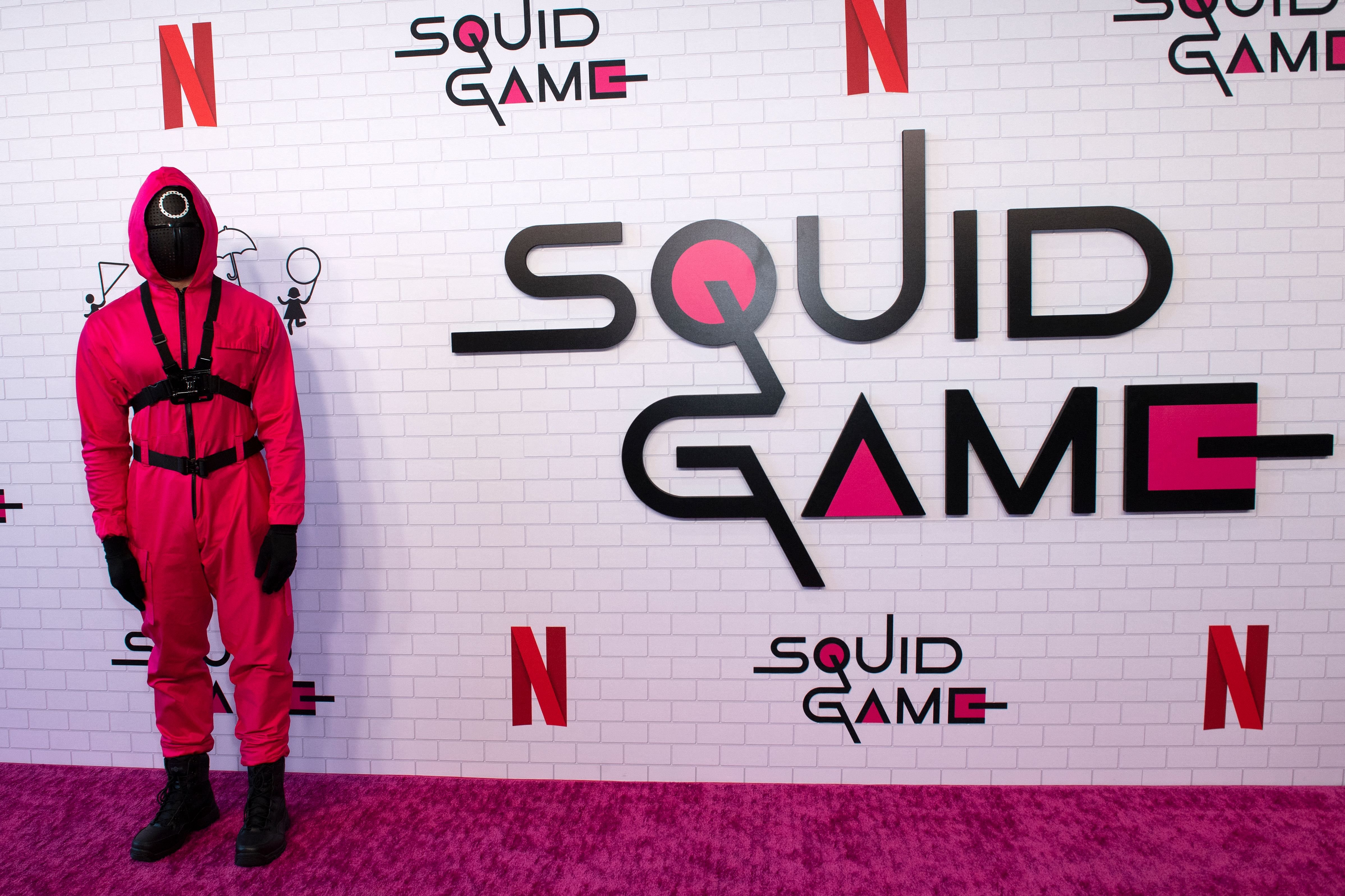 A pink guard is part of the ambiance at Netflix's "Squid Game" Special Event on June 12, 2022 in Los Angeles. | Source: Getty Images