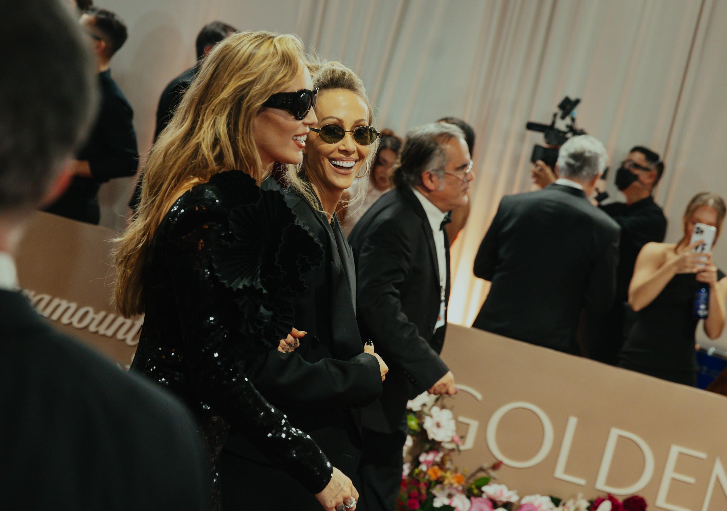 Miley Cyrus and Tish Cyrus at the WWD Eye on the Red Carpet during the Golden Globes at the Beverly Hilton on January 11, 2026, in Beverly Hills, California | Source: Getty Images