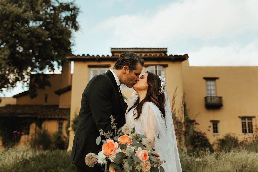 Combs and Ryan's wedding photos felt romantic without being showy. Their story had the softness of a second chance, but the weight of real life behind it. | Source: Facebook/Holly Marie Combs