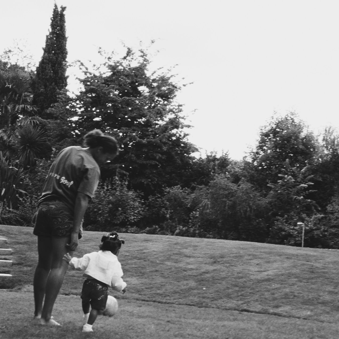 Naomi Osaka walking with her daughter outside, posted on January 1, 2025. | Source: Facebook/Naomi Osaka 大坂なおみ﻿