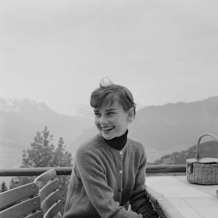 Belgian-born actress Audrey Hepburn (1929 - 1993) on the terrace of the Restaurant Hammetschwand at the summit of the Bürgenstock, Switzerland, circa 1955. | Photo: Getty Images