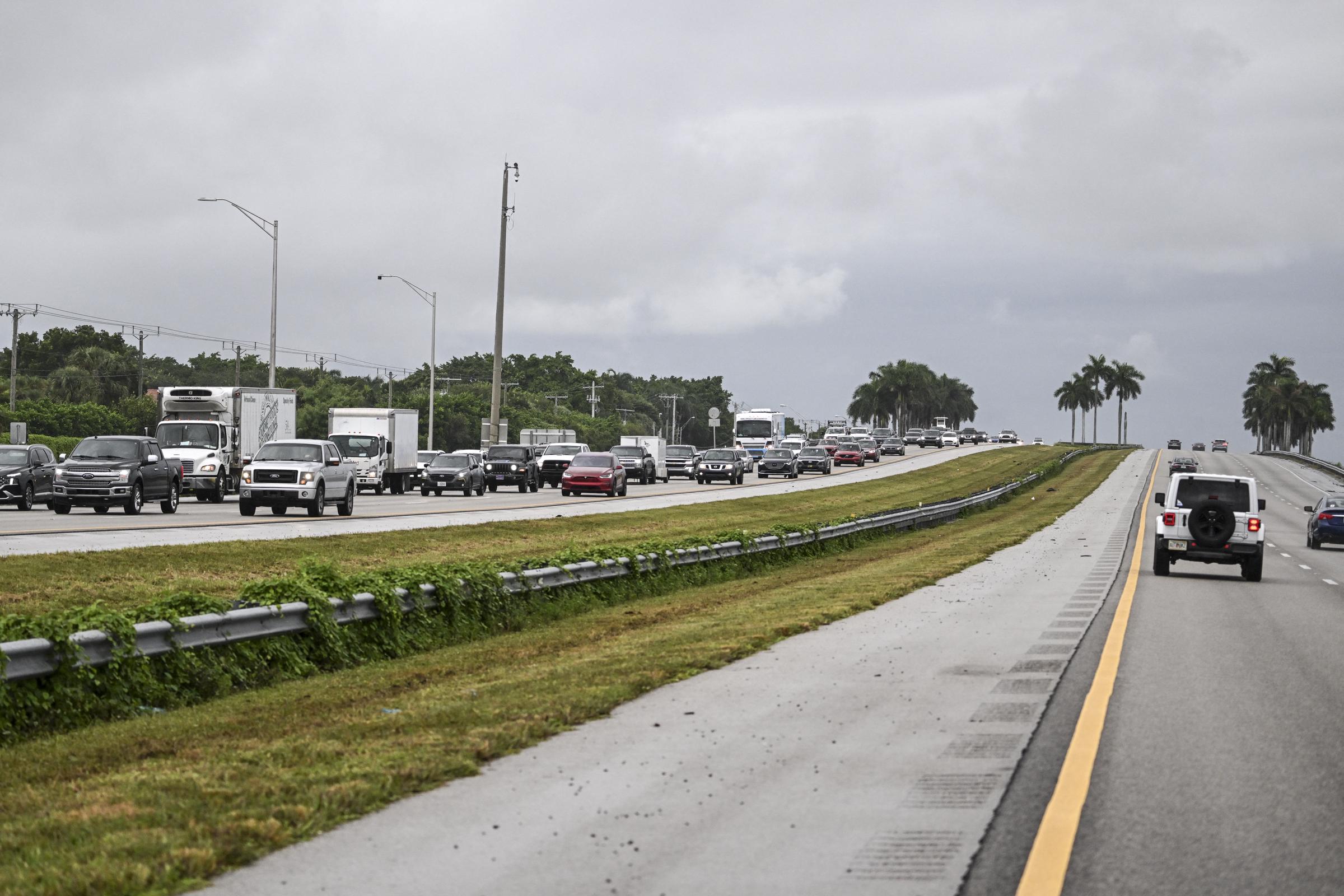 Vehicles pictured driving east as Hurricane Milton approaches on October 8, 2024, in Naples, Florida. | Source: Getty Images