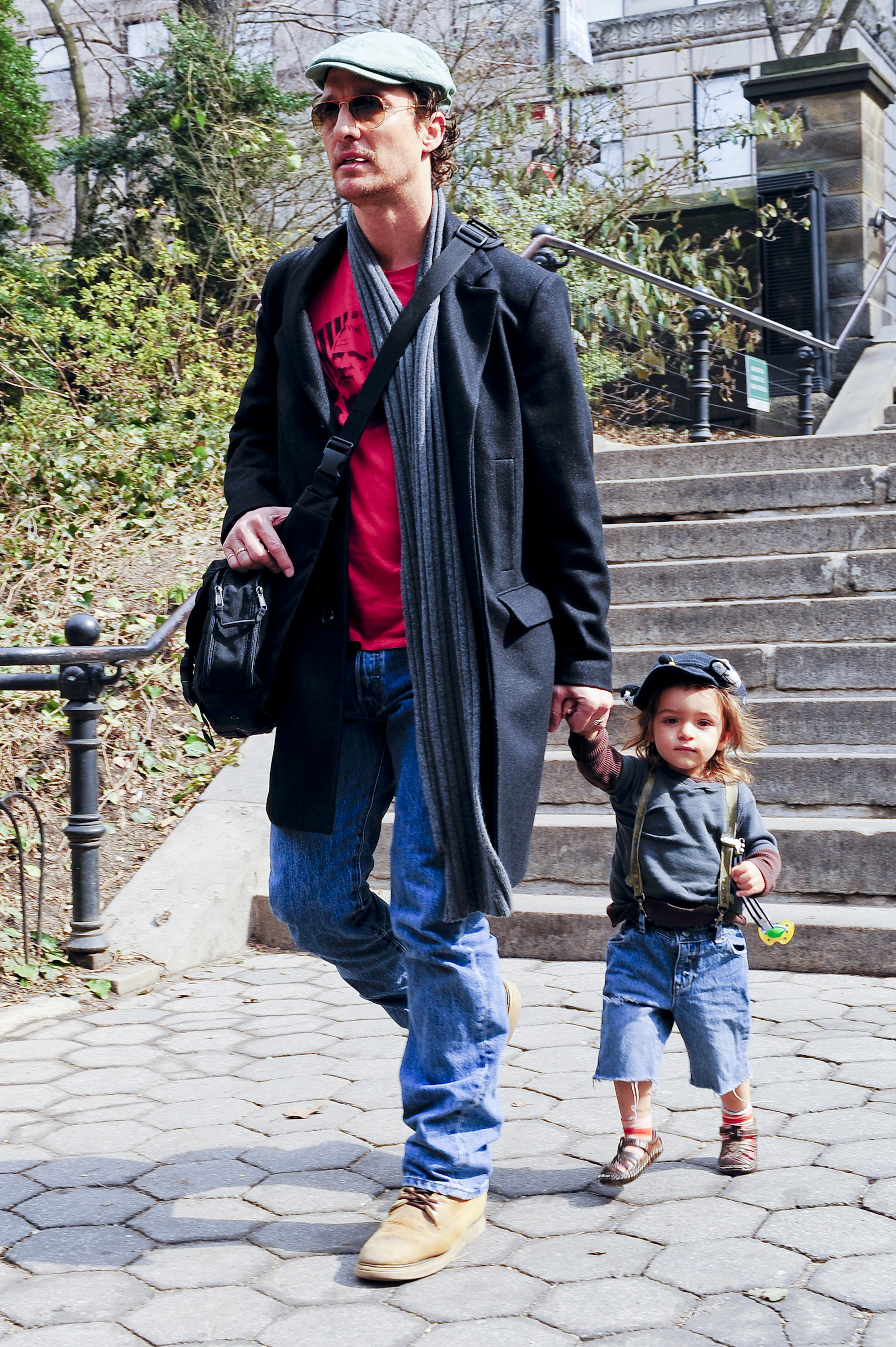 Just a boy and his hero — Levi McConaughey holds tight to his father’s hand while heading to the Central Park Zoo in New York City on March 10, 2010.