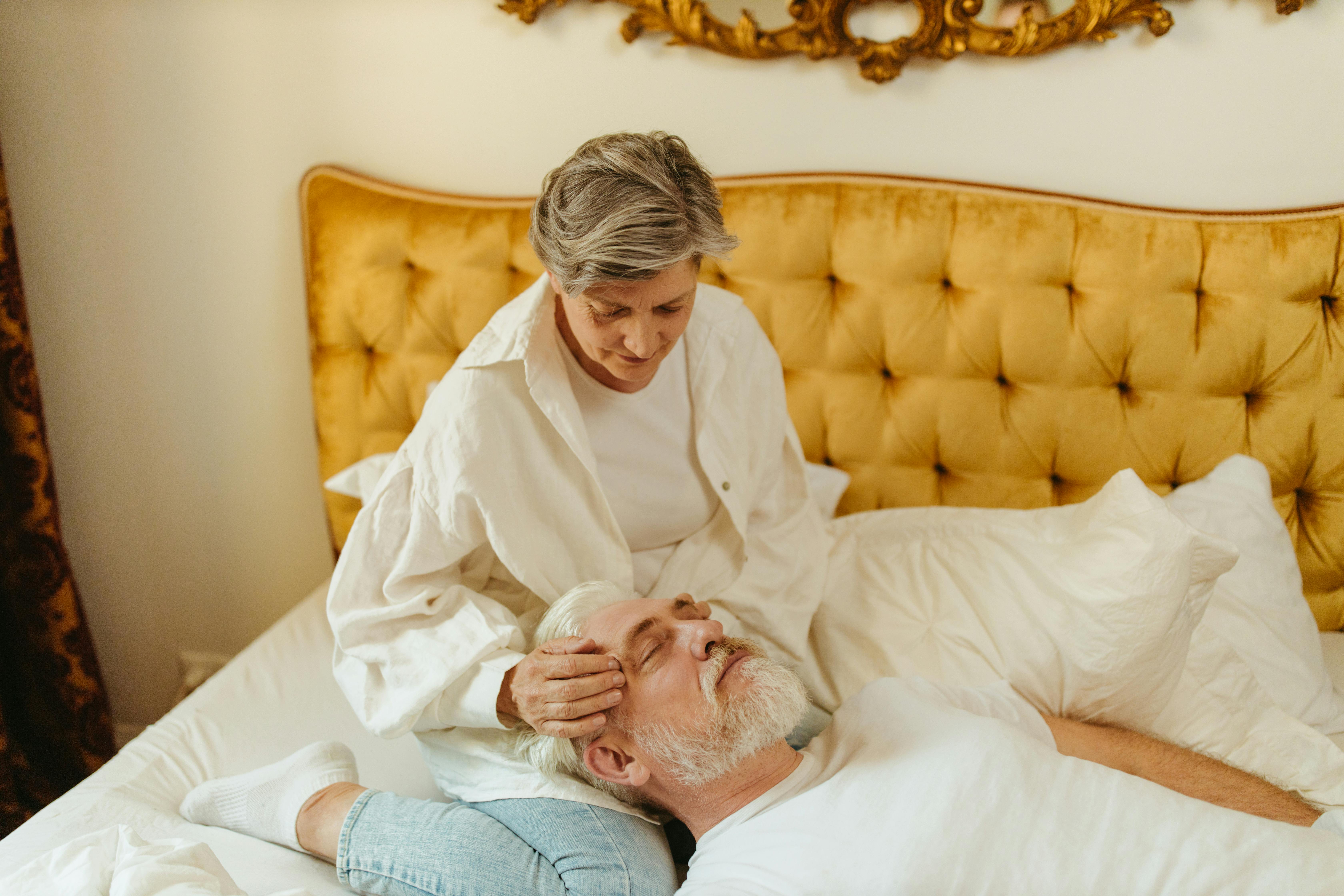 A woman massaging her husband | Source: Pexels