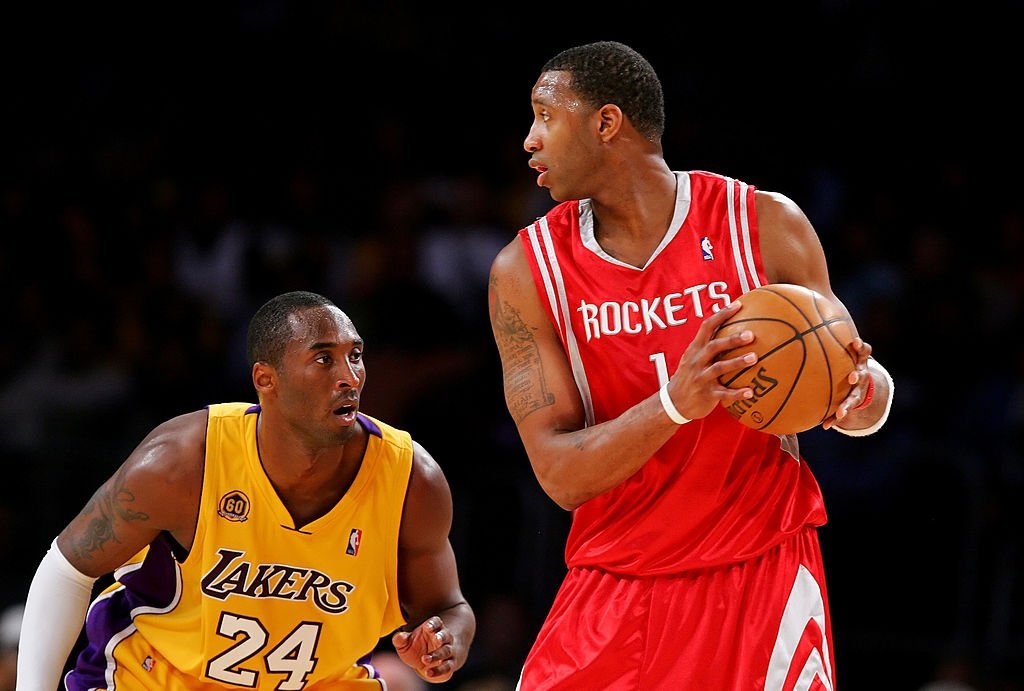 Kobe Bryant #24 of the Los Angeles Lakers puts the pressure on Tracy McGrady #1 of the Houston Rockets at Staples Center | Photo: Getty Images