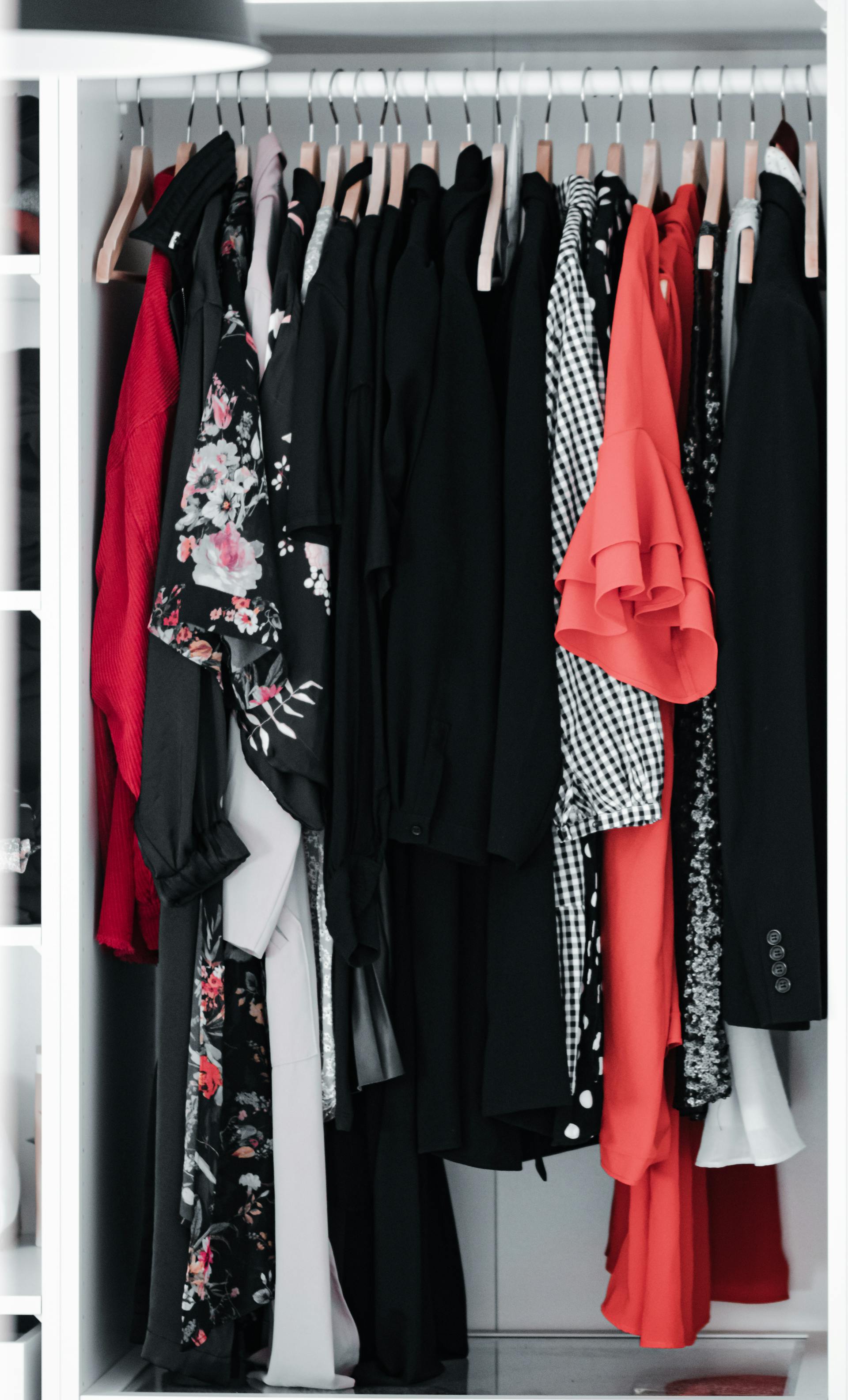 A woman's clothes hanging in a closet | Source: Pexels