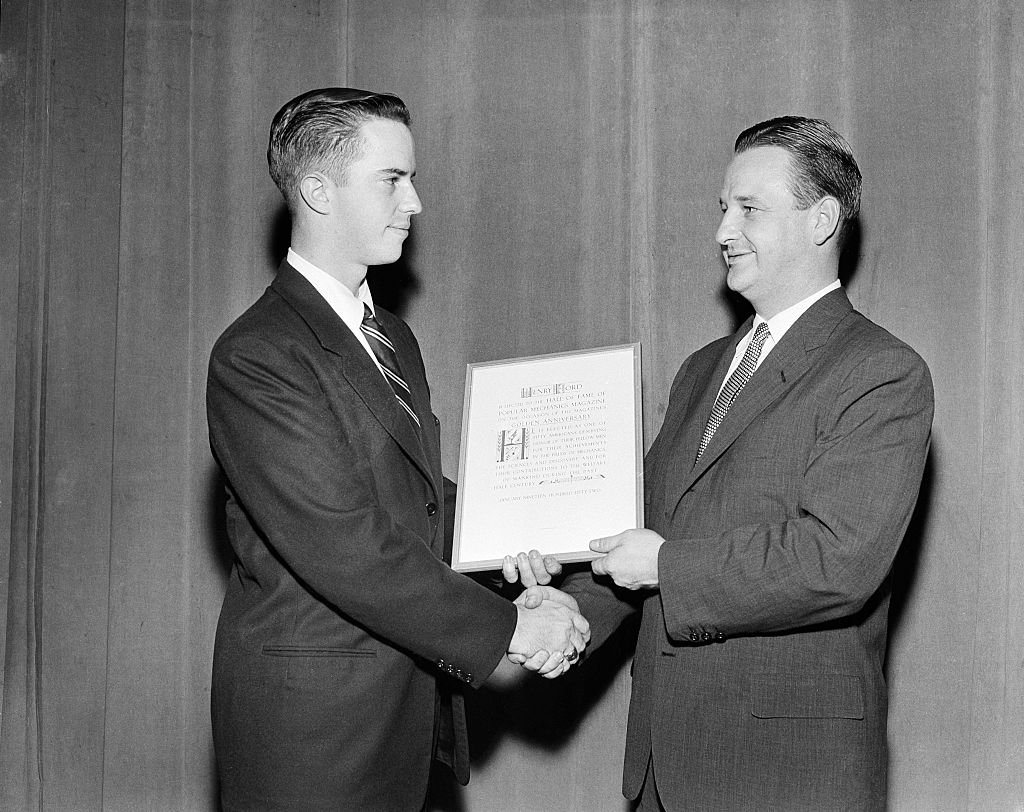 Benson Ford Sr. gives a Henry Ford award to a young winner on the "Toast of the Town" show in New York, circa 1952 | Photo: Getty Images