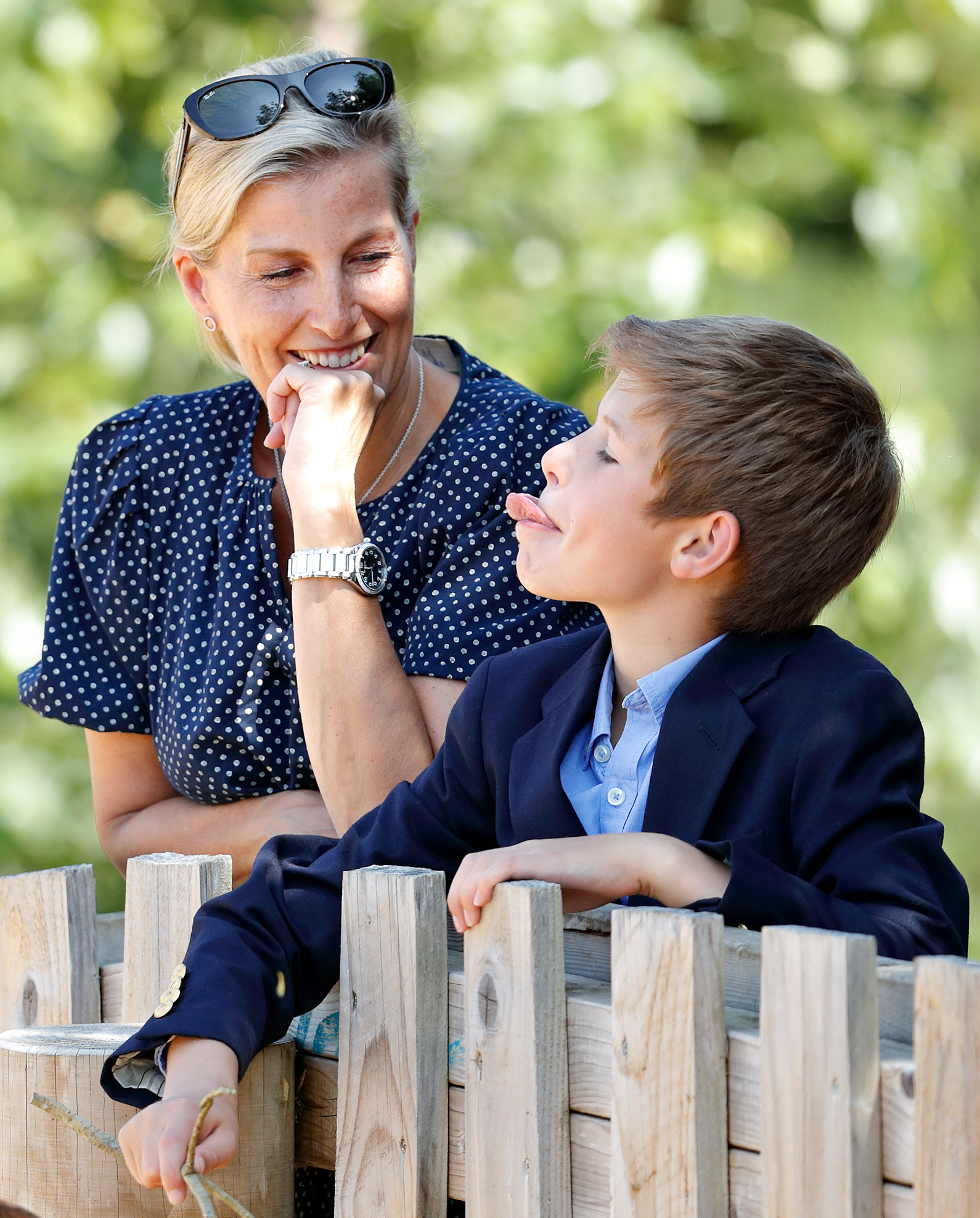 A moment of joy: Sophie and James feed a giraffe during a visit to Bristol Zoo's Wild Place Project on 23 July 2019. The playful photo captured their close bond during a light-hearted royal engagement.