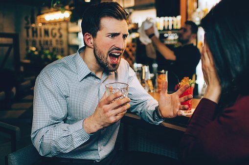 A picture of a guy screaming at a girl | Photo: Getty Images