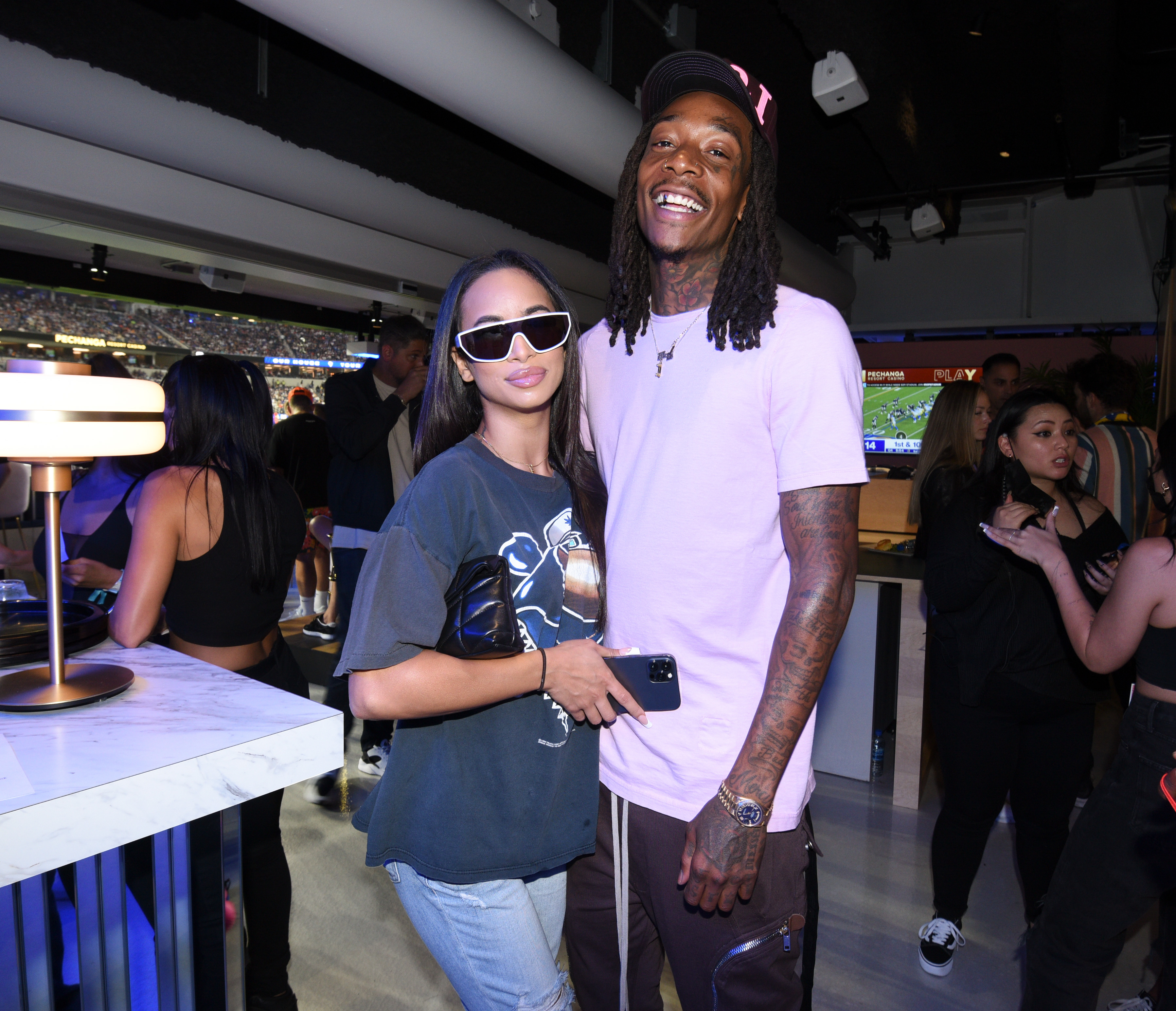 Aimee Aguilar and Wiz Khalifa at Bootsy Bellows during SoFi Stadium's Opening Day on September 12, 2021, in Inglewood, California. | Source: Getty Images