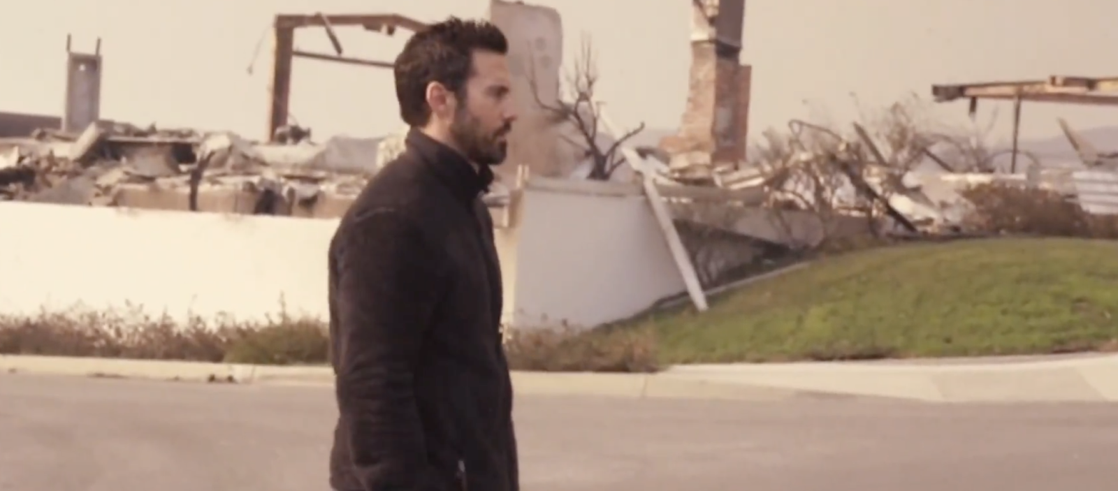 Milo Ventimiglia inspecting the scenes of destruction in his neighborhood after the Los Angeles wildfires. | Source: X/CBS Evening News