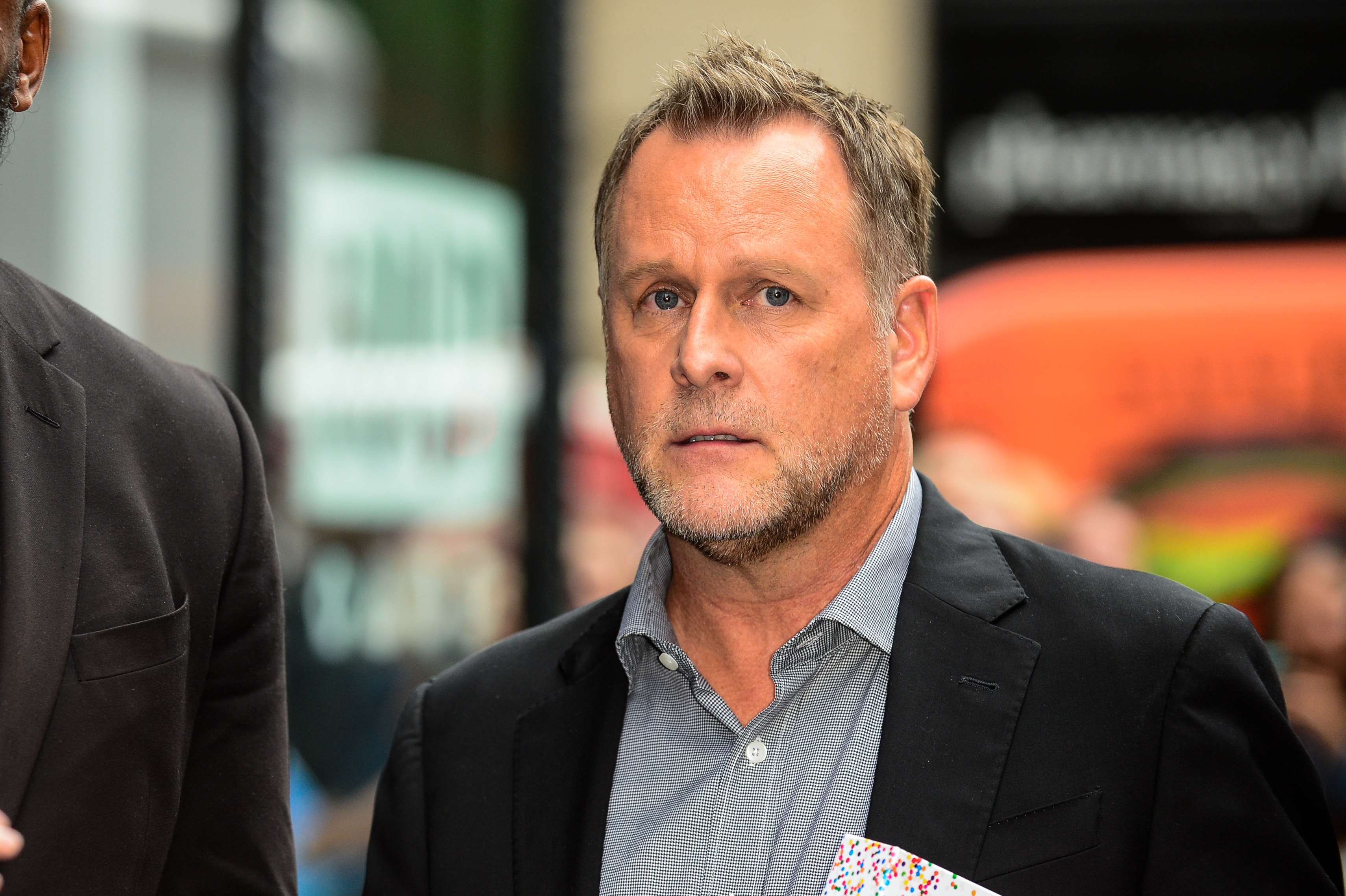 Dave Coulier leaves the "AOL Build" taping in New York City on September 18, 2017 | Source: Getty Images