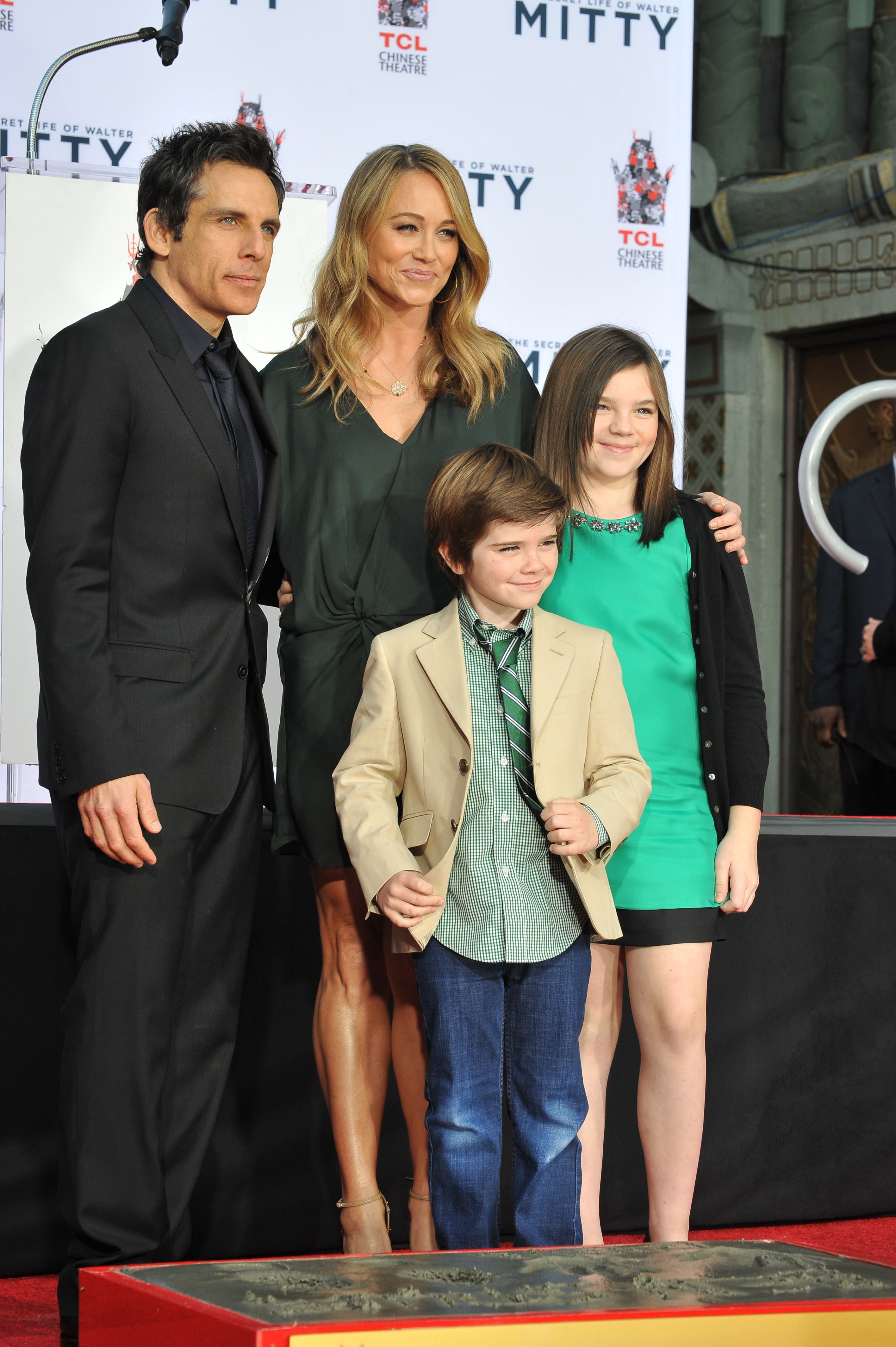 Quinlin, Ben, and Ella Stiller with Christine Taylor at Ben Stiller's Hand/Footprint Ceremony in Hollywood, California on December 3, 2013 | Source: Getty Images