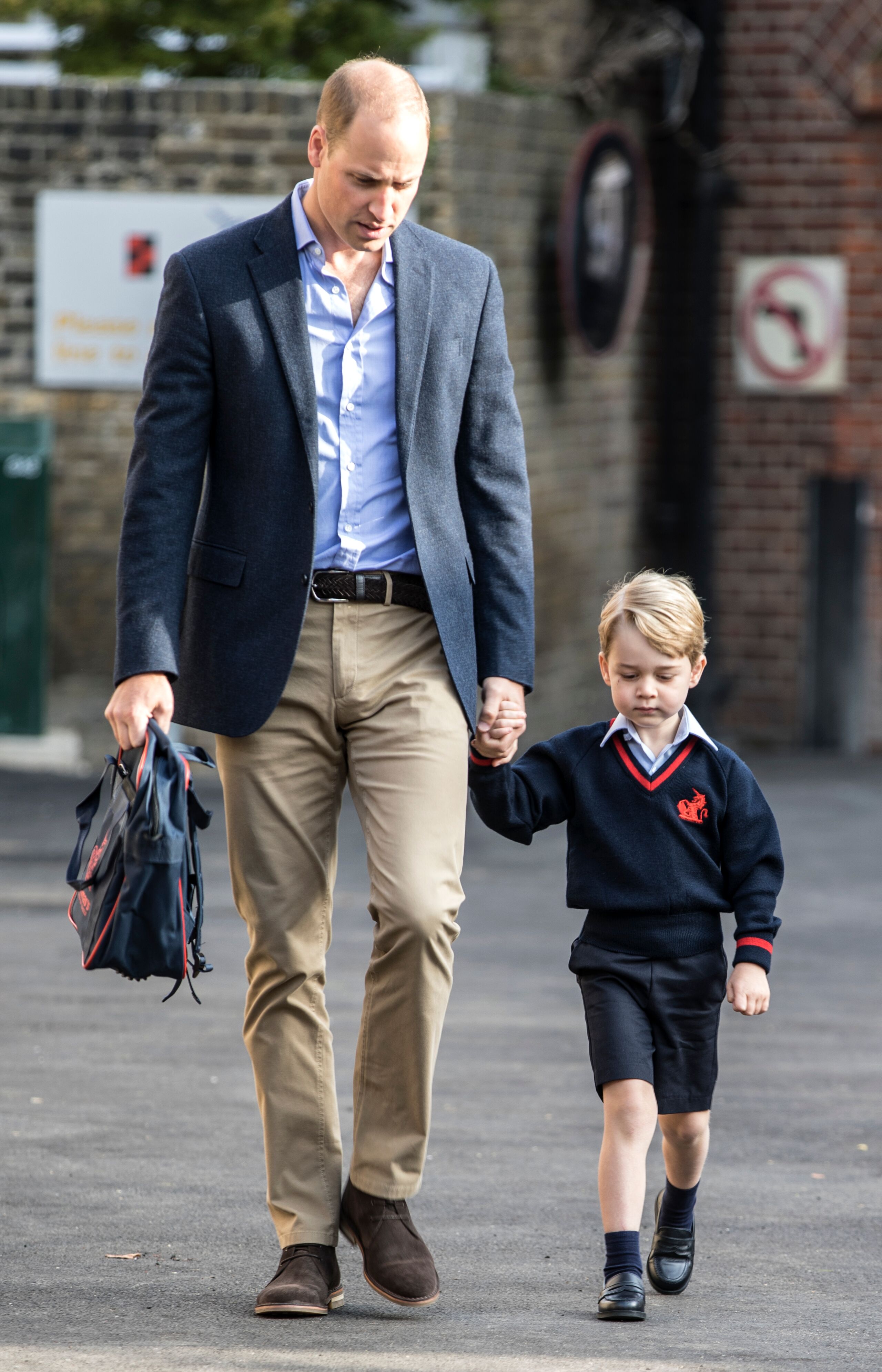 Prince George arrives for his first day of school at Thomas's Battersea with his father Prince William. | Source: Getty Images
