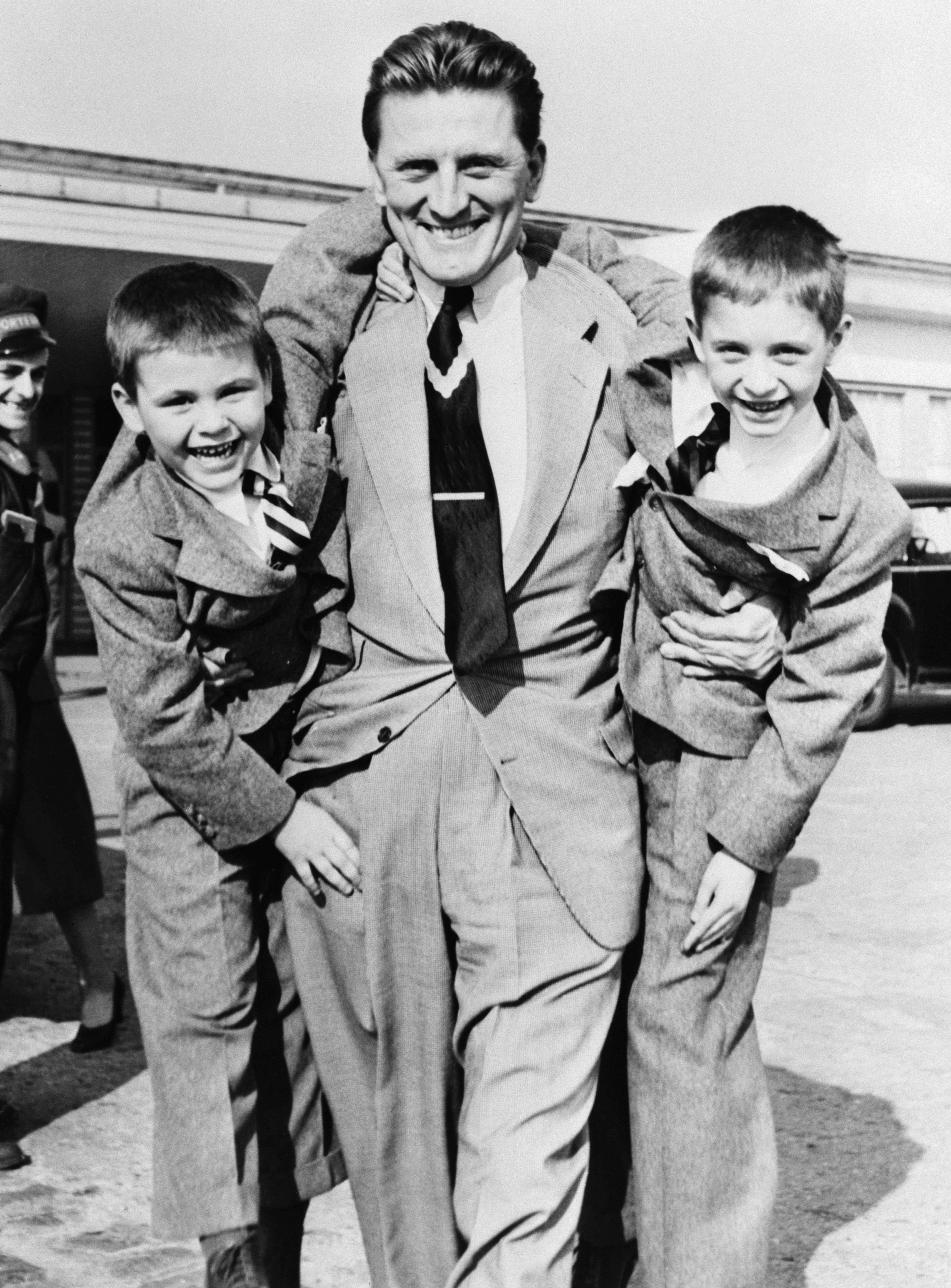 Kirk Douglas, and his sons Michael and Joel at Orly Airport circa 1953 | Source: Getty Images