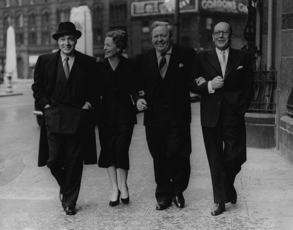 Charles Boyer, Agnes Moorhead, Charles Laughton, and Sir Cedric Hardwicke taking a stroll through Manchester, circa 1950s. | Photo: Getty Images