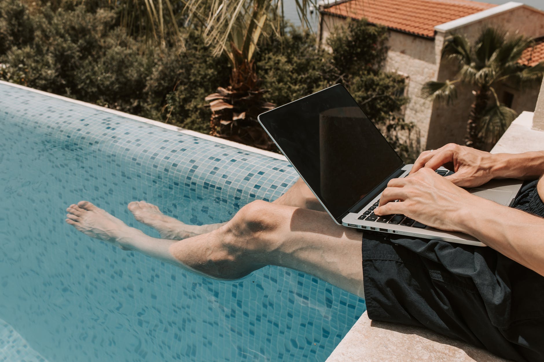 Brandon sat down by the pool and eavesdropped on his wife. | Source: Pexels