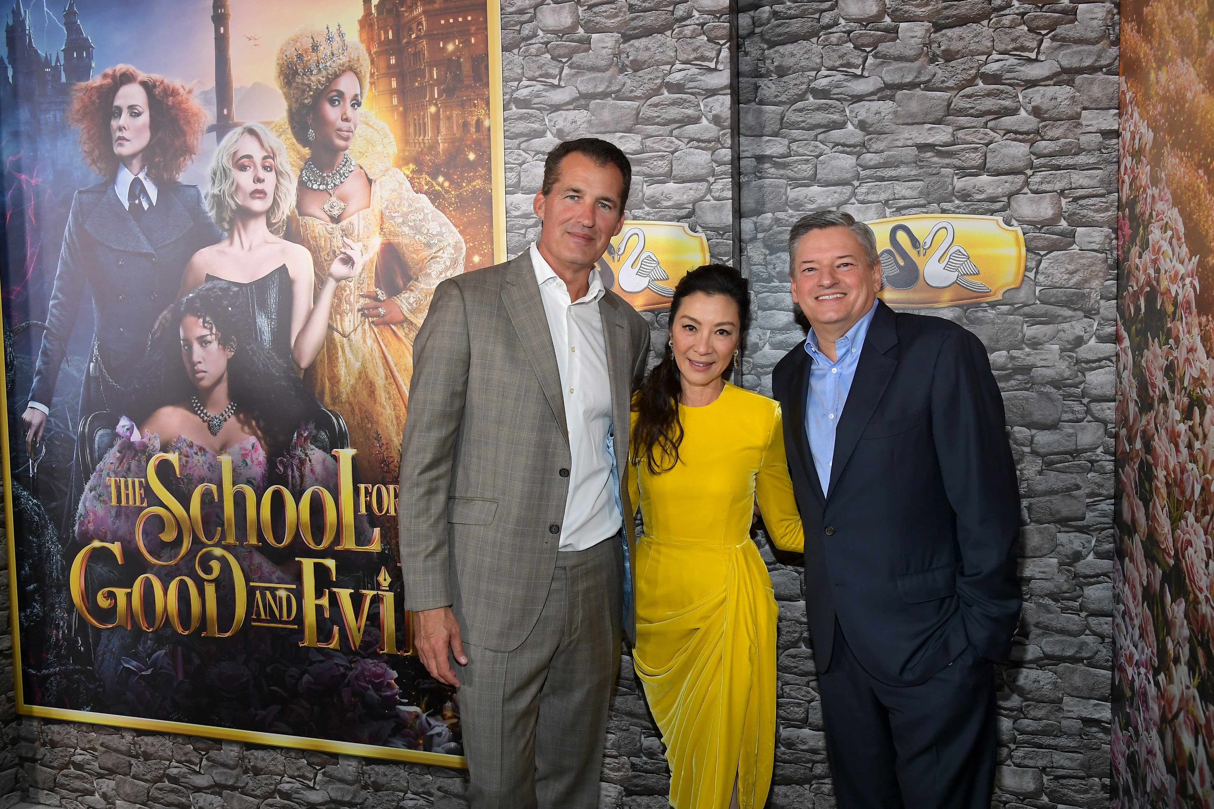 Scott Stuber, actress Michelle Yeoh, and Netflix Co-CEO and Chief Content Officer Ted Sarandos at the premiere of "The School For Good And Evil" on October 18, 2022 in Los Angeles, California. | Source: Getty Images