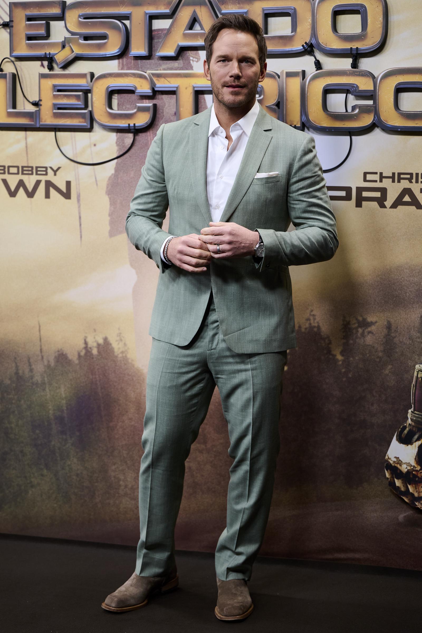 Chris Pratt posing for photos on the red carpet at "The Electric State" premiere. | Source: Getty Images