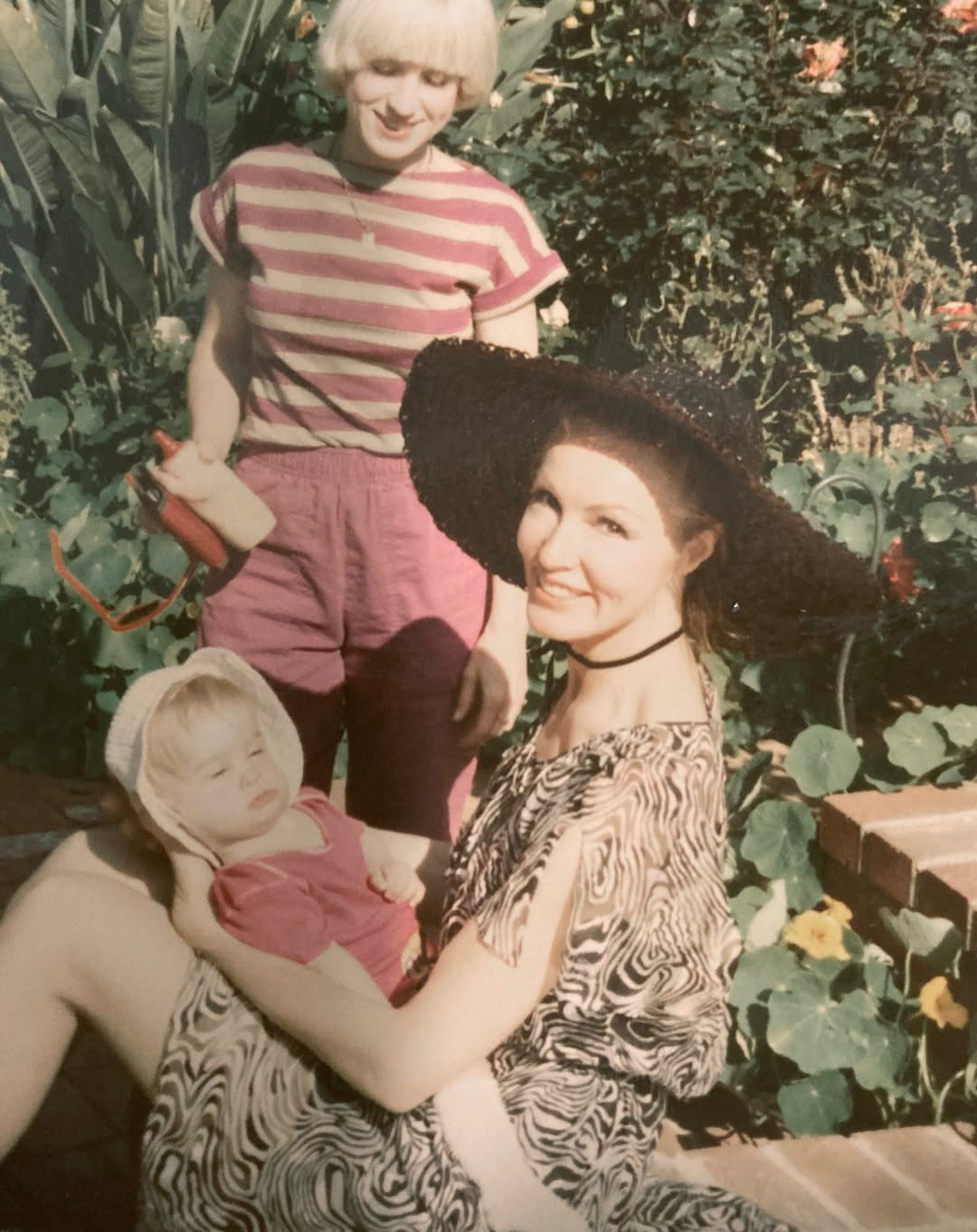 Julie Newmar, her son, and his first caretaker from a post dated November 22, 2023. | Source: Instagram/julienewmarofficial